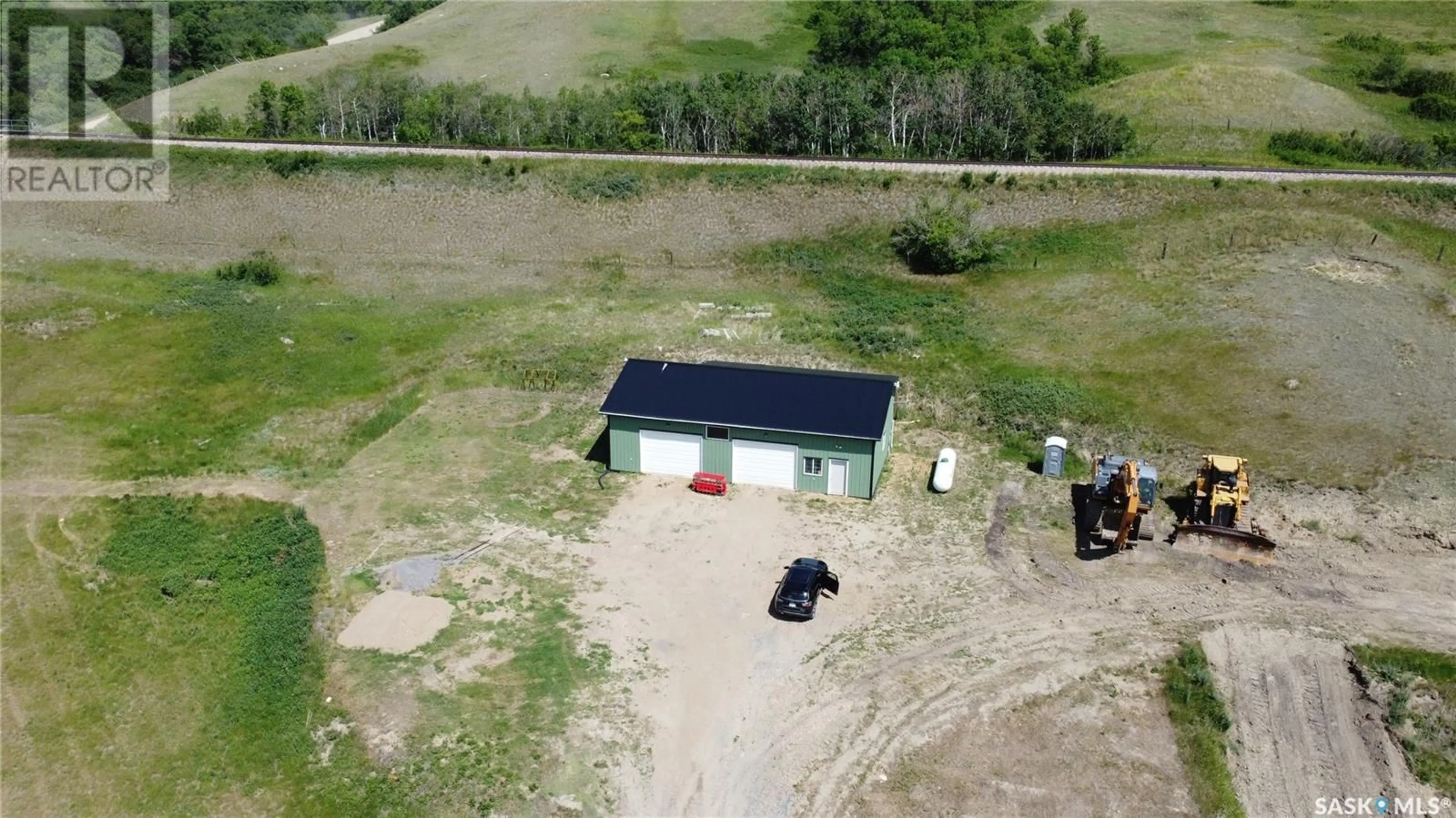 A pic from outside/outdoor area/front of a property/back of a property/a pic from drone, building for LUMSDEN VALLEY, Lumsden Rm No. 189 Saskatchewan S0G3C0