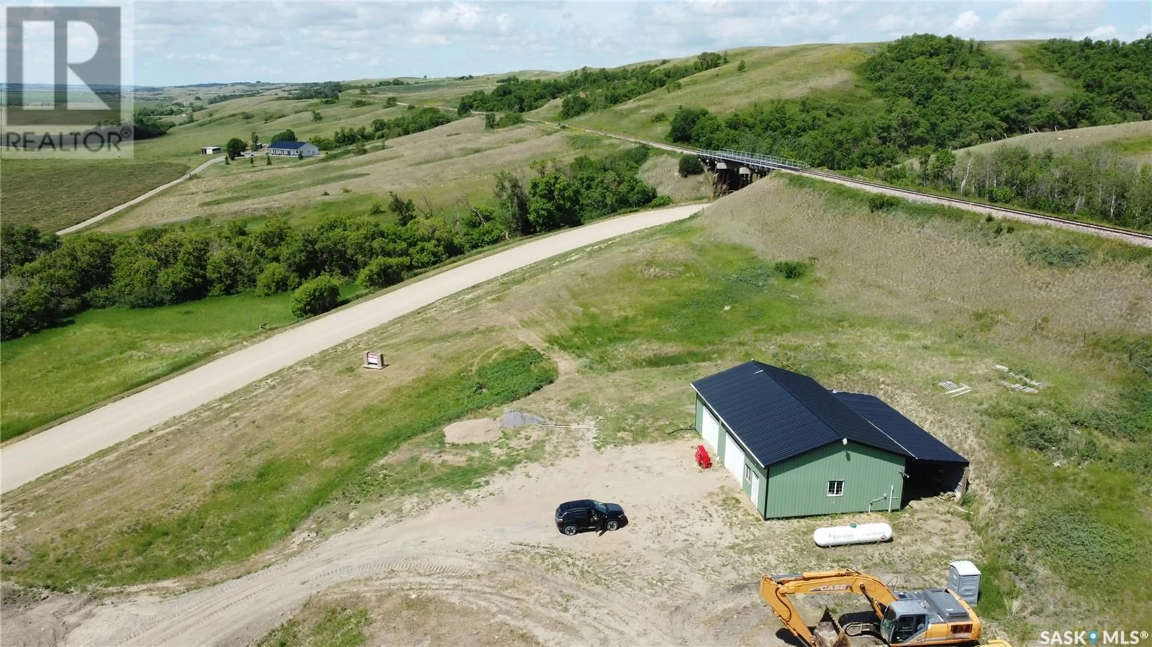 A pic from outside/outdoor area/front of a property/back of a property/a pic from drone, building for LUMSDEN VALLEY, Lumsden Rm No. 189 Saskatchewan S0G3C0