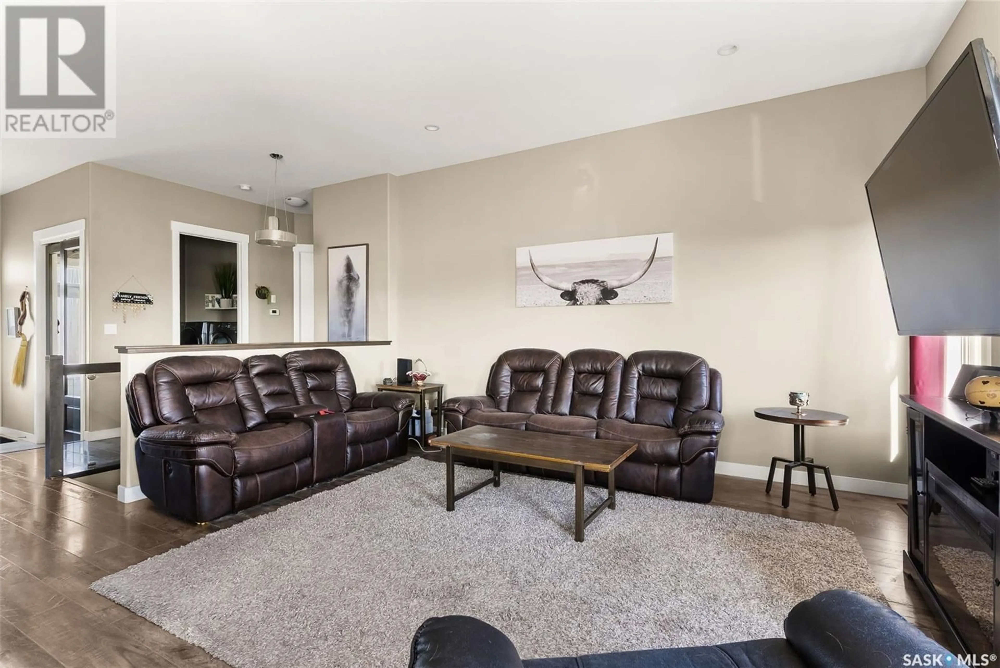 Living room with furniture, unknown for 312 PLAINS COURT, Pilot Butte Saskatchewan S0G3Z0