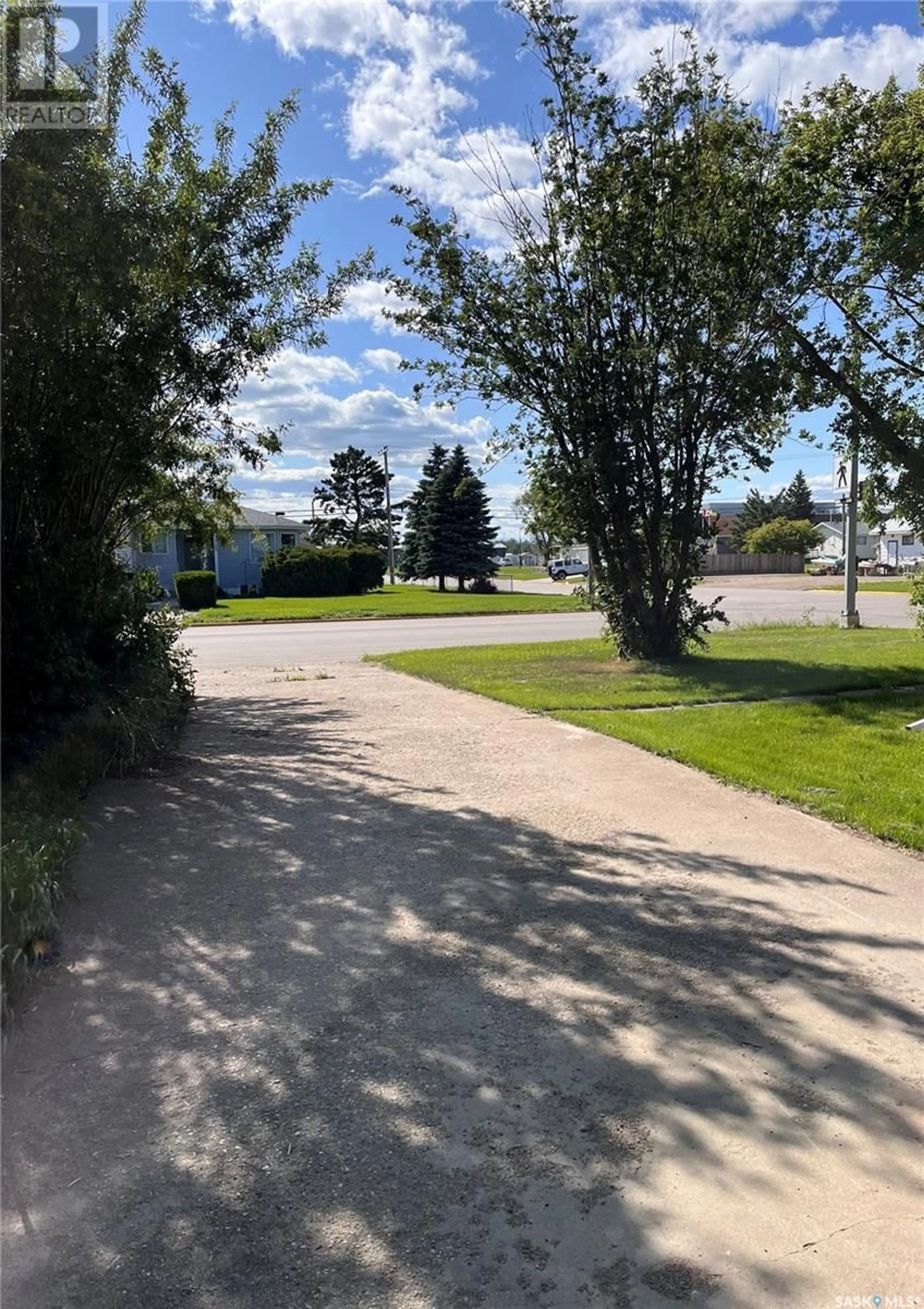 A pic from outside/outdoor area/front of a property/back of a property/a pic from drone, street for 1126 1ST STREET, Carrot River Saskatchewan S0E0L0