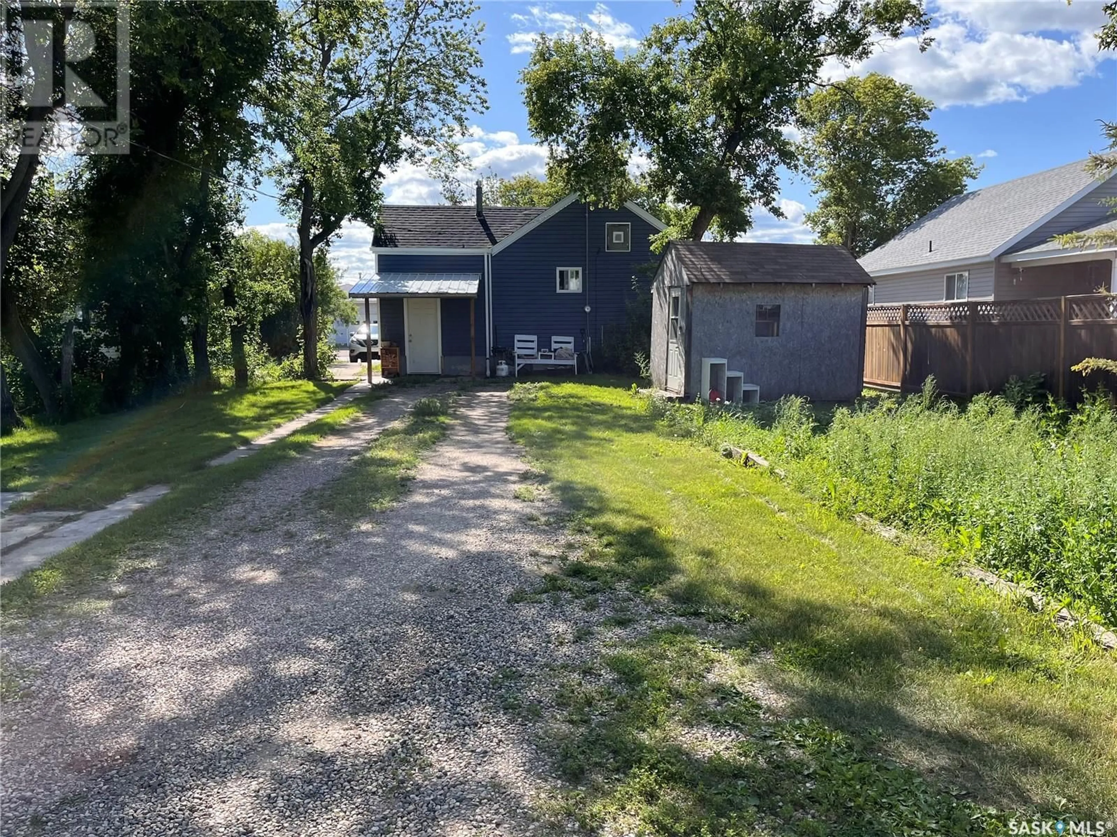 A pic from outside/outdoor area/front of a property/back of a property/a pic from drone, street for 1126 1ST STREET, Carrot River Saskatchewan S0E0L0