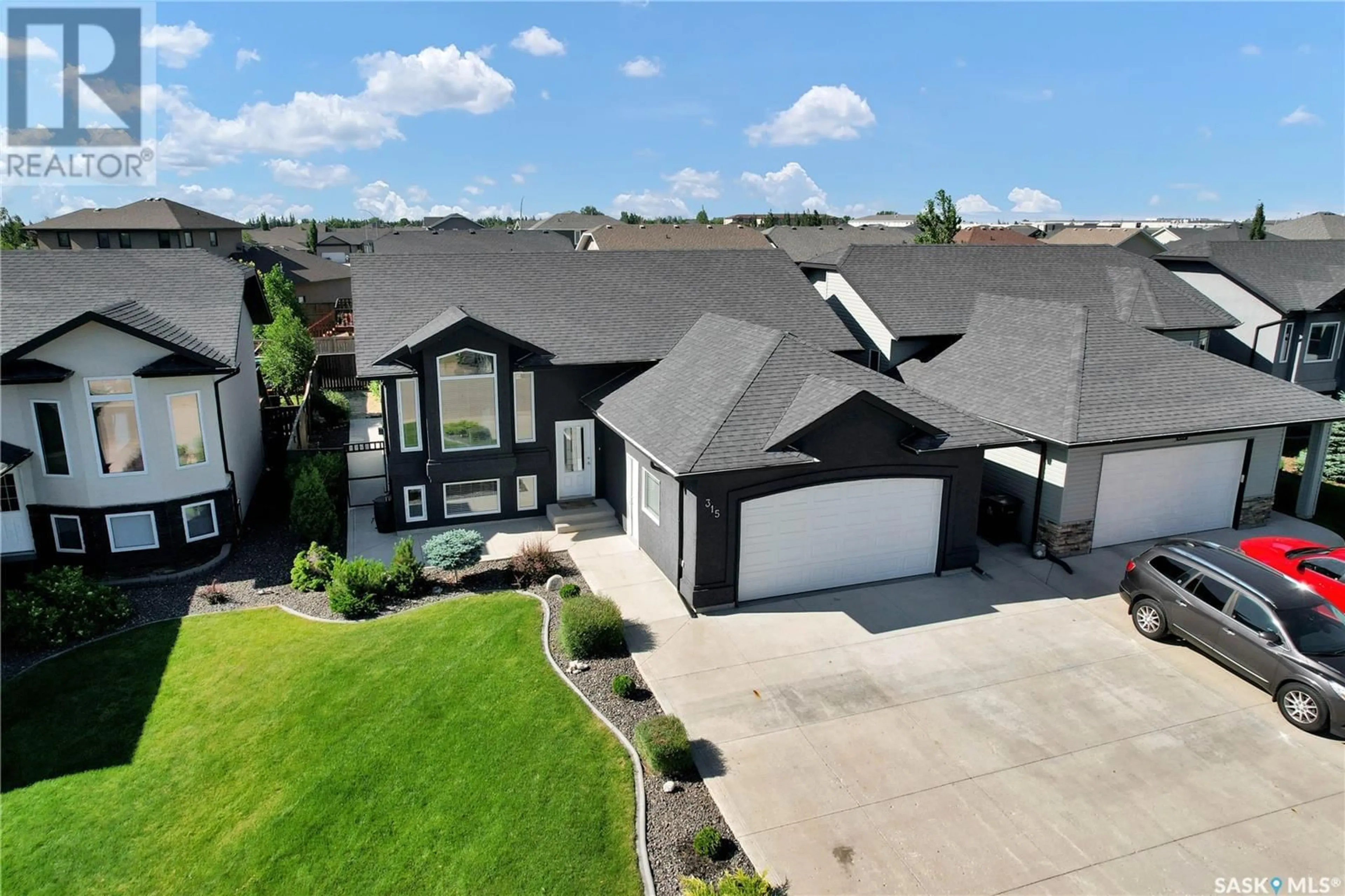 A pic from outside/outdoor area/front of a property/back of a property/a pic from drone, street for 315 AUGUSTA BOULEVARD, Warman Saskatchewan S0K4S1