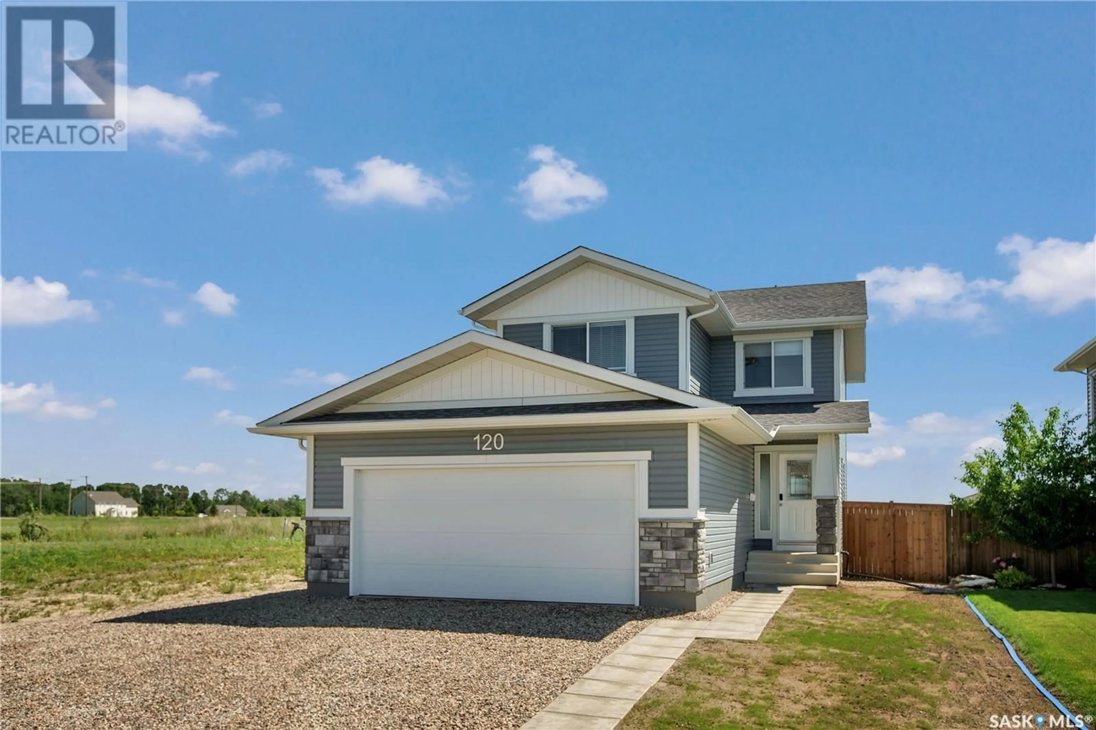 Home with vinyl exterior material, street for 120 BITNER PLACE, Dalmeny Saskatchewan S0K1E0