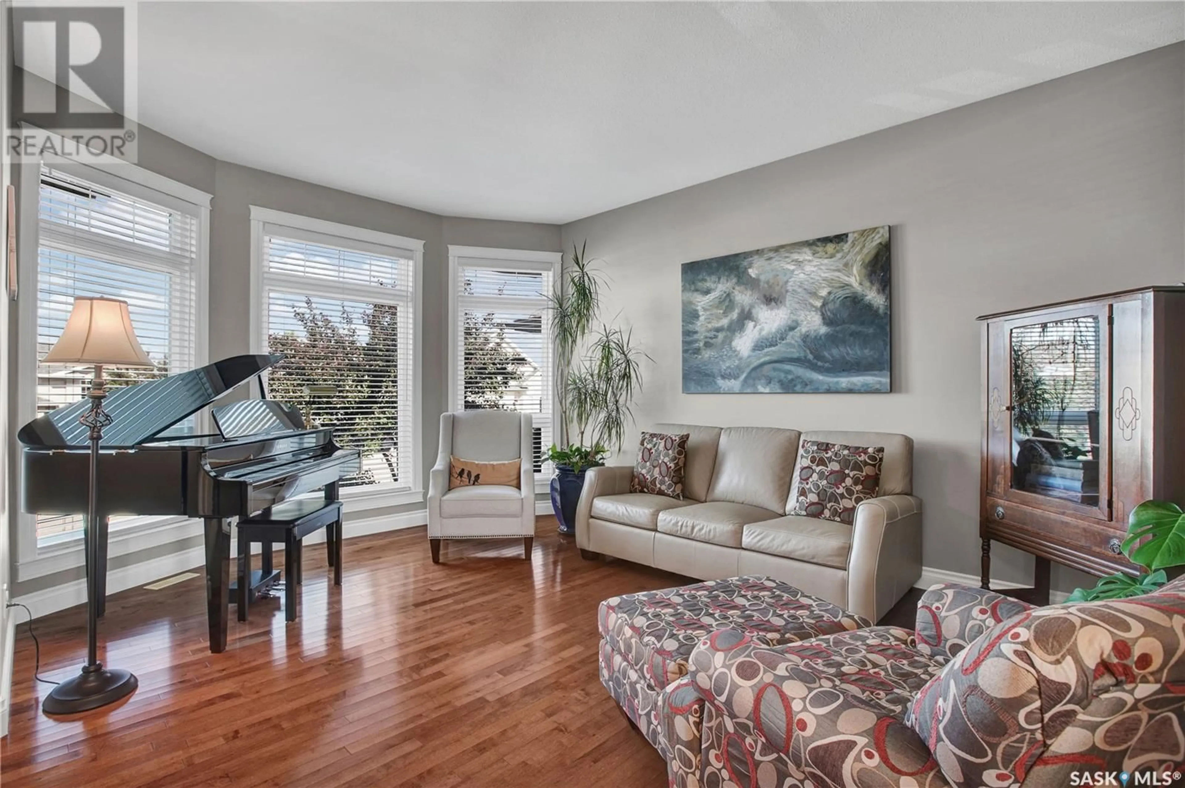 Living room with furniture, unknown for 304 CORNERBROOK COURT, Warman Saskatchewan S0K0A1