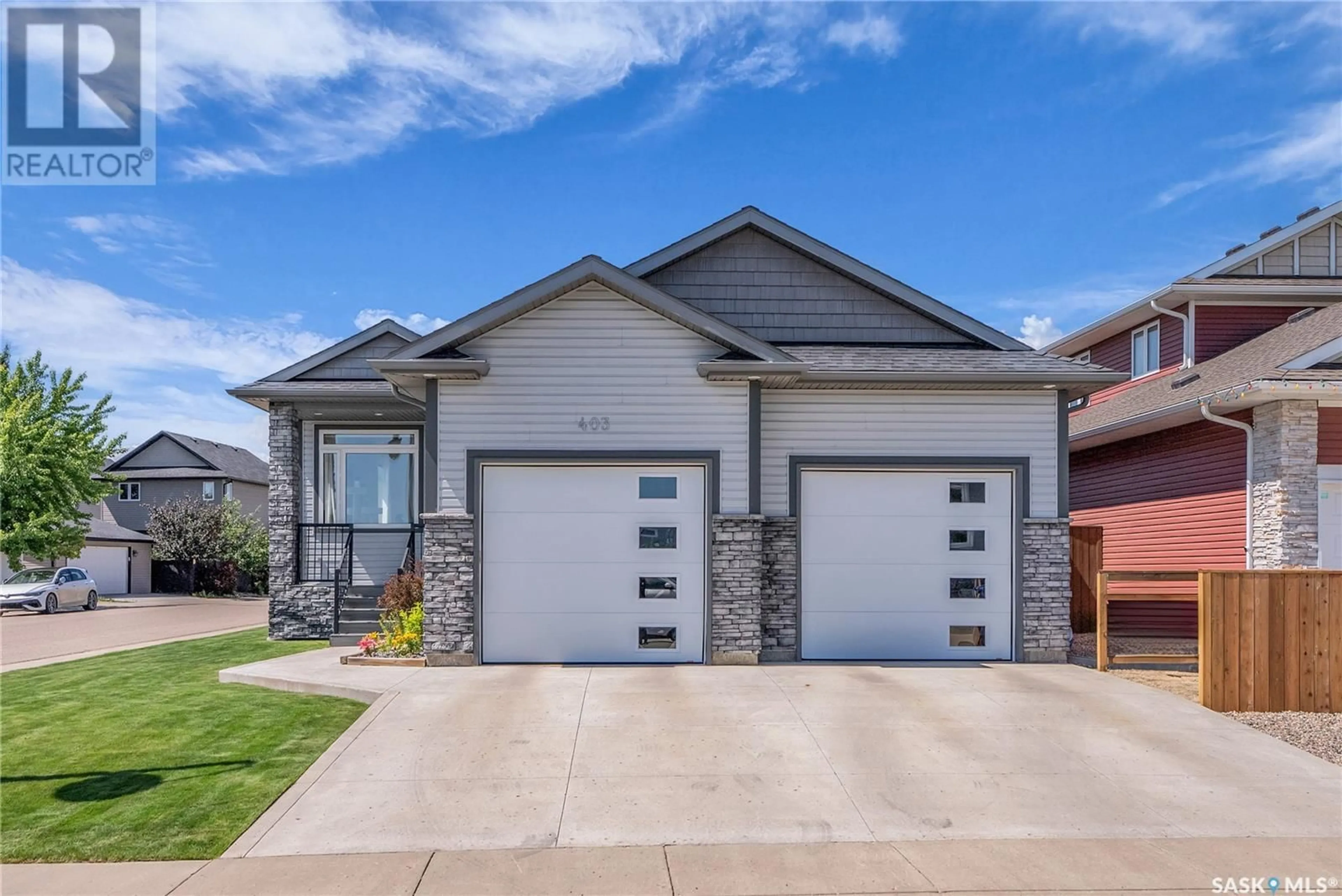Home with brick exterior material, street for 403 LANGLOIS WAY, Saskatoon Saskatchewan S7T0M9