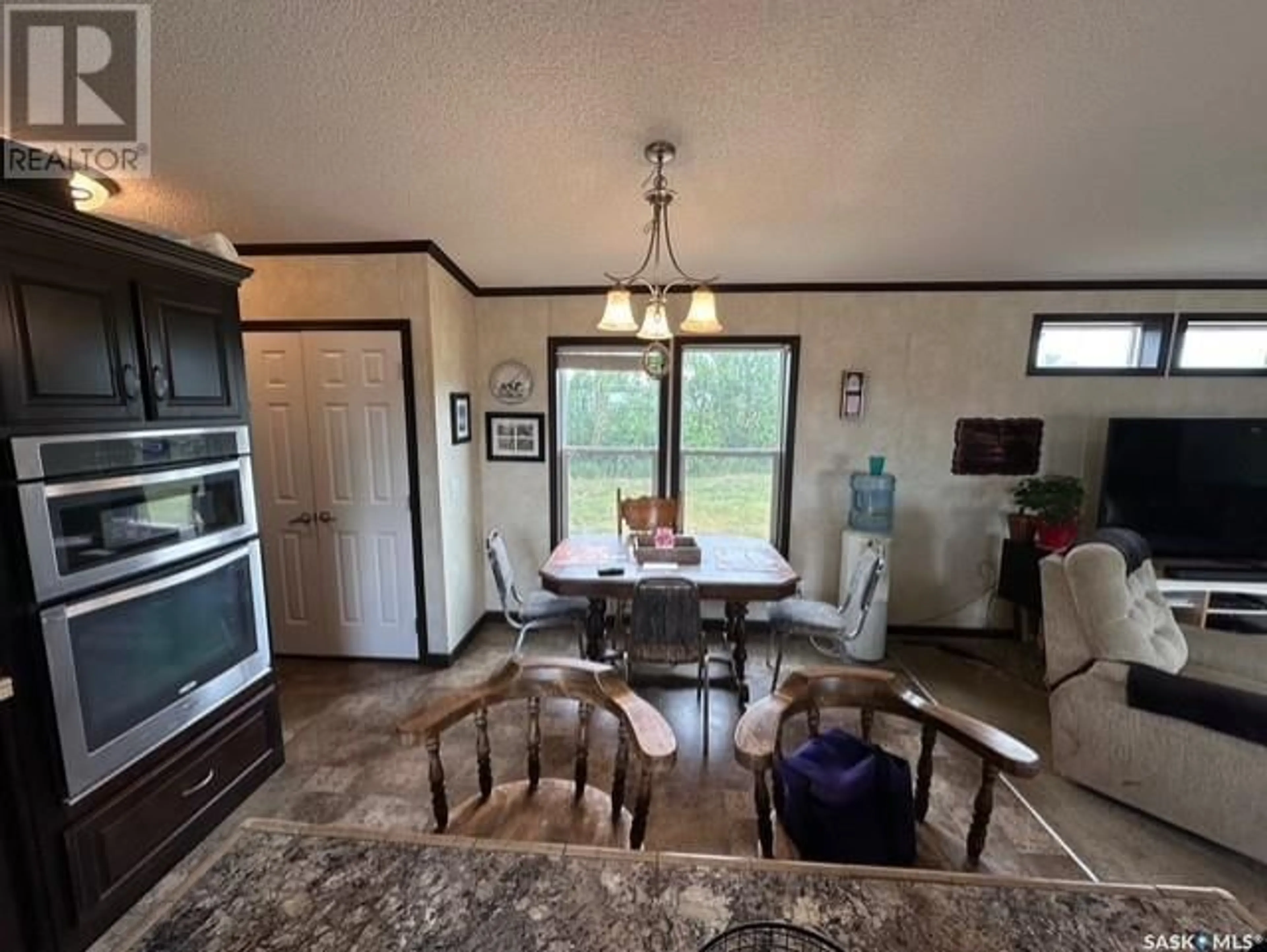 Open concept kitchen, ceramic/tile floor for SCHUWEILER ACREAGE, Stonehenge Rm No. 73 Saskatchewan S0H0B0
