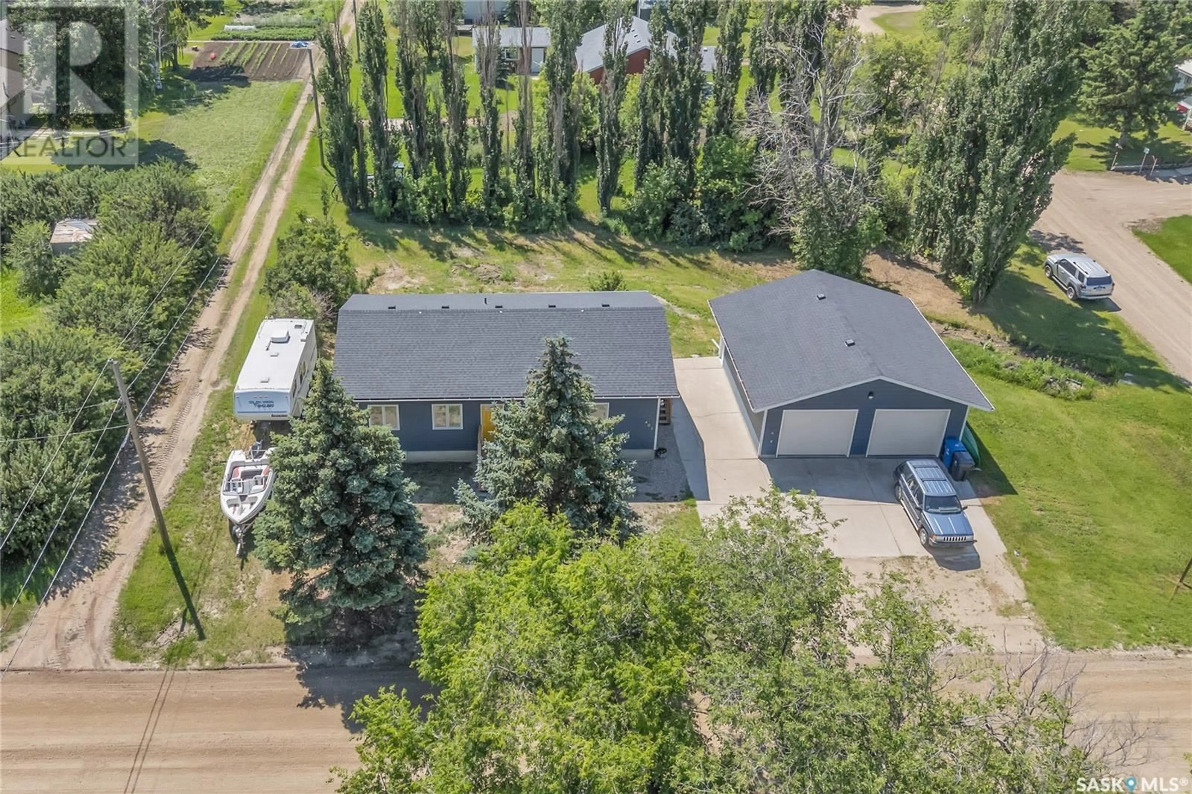 A pic from outside/outdoor area/front of a property/back of a property/a pic from drone, unknown for 402 ALEXANDER STREET, Radisson Saskatchewan S0K3L0