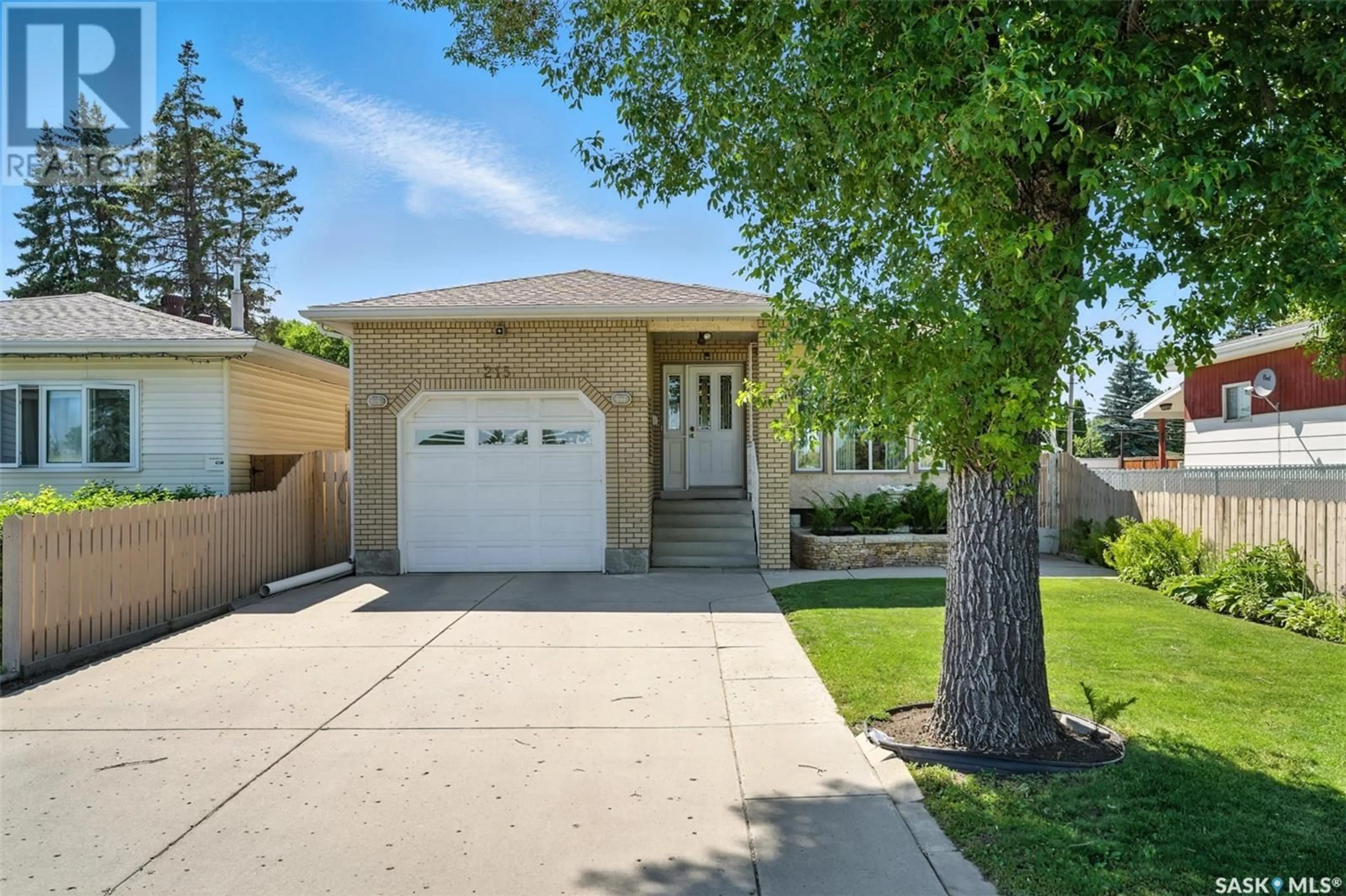 Home with brick exterior material, street for 215 P AVENUE, Saskatoon Saskatchewan S7L2V6