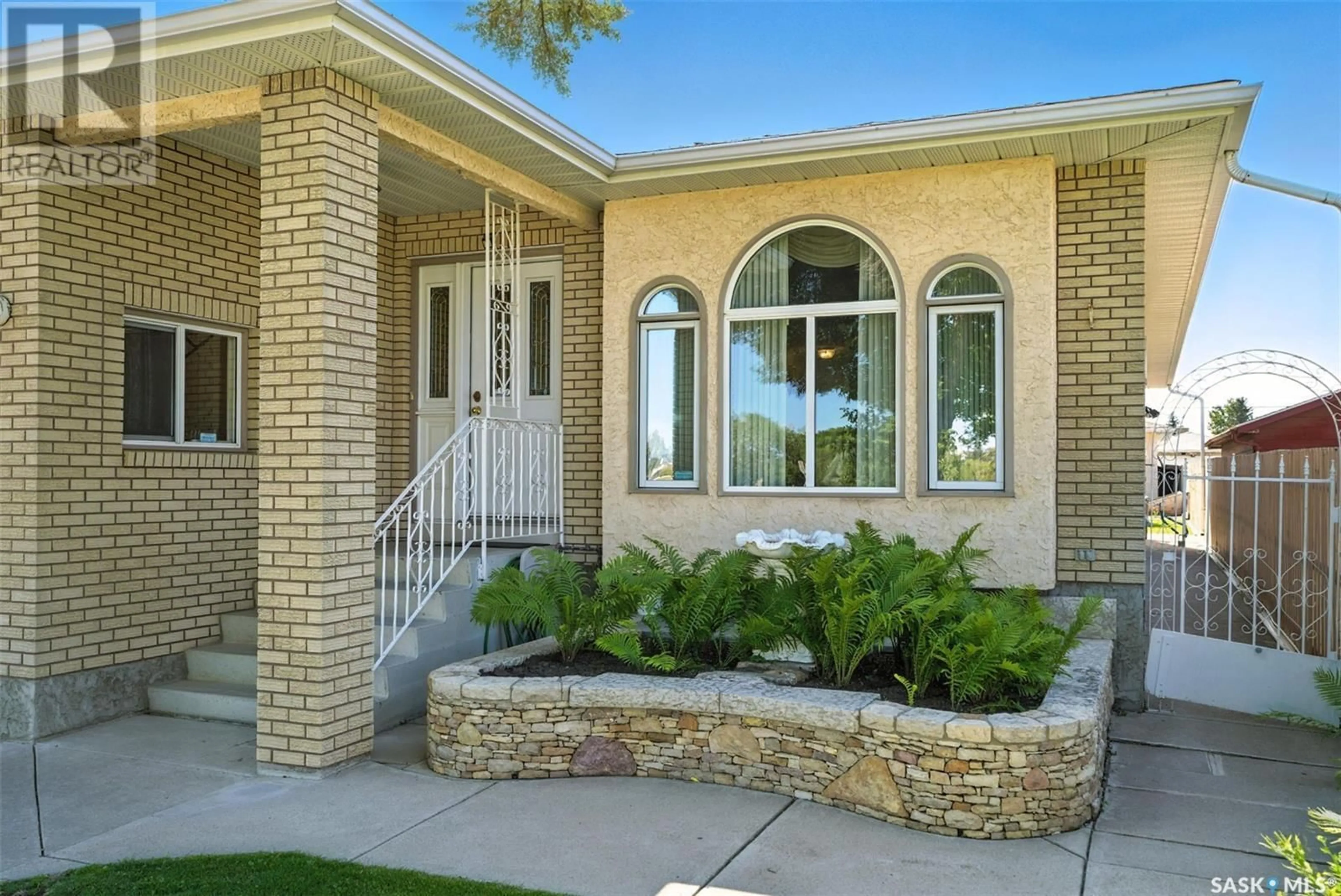 Home with brick exterior material, street for 215 P AVENUE, Saskatoon Saskatchewan S7L2V6