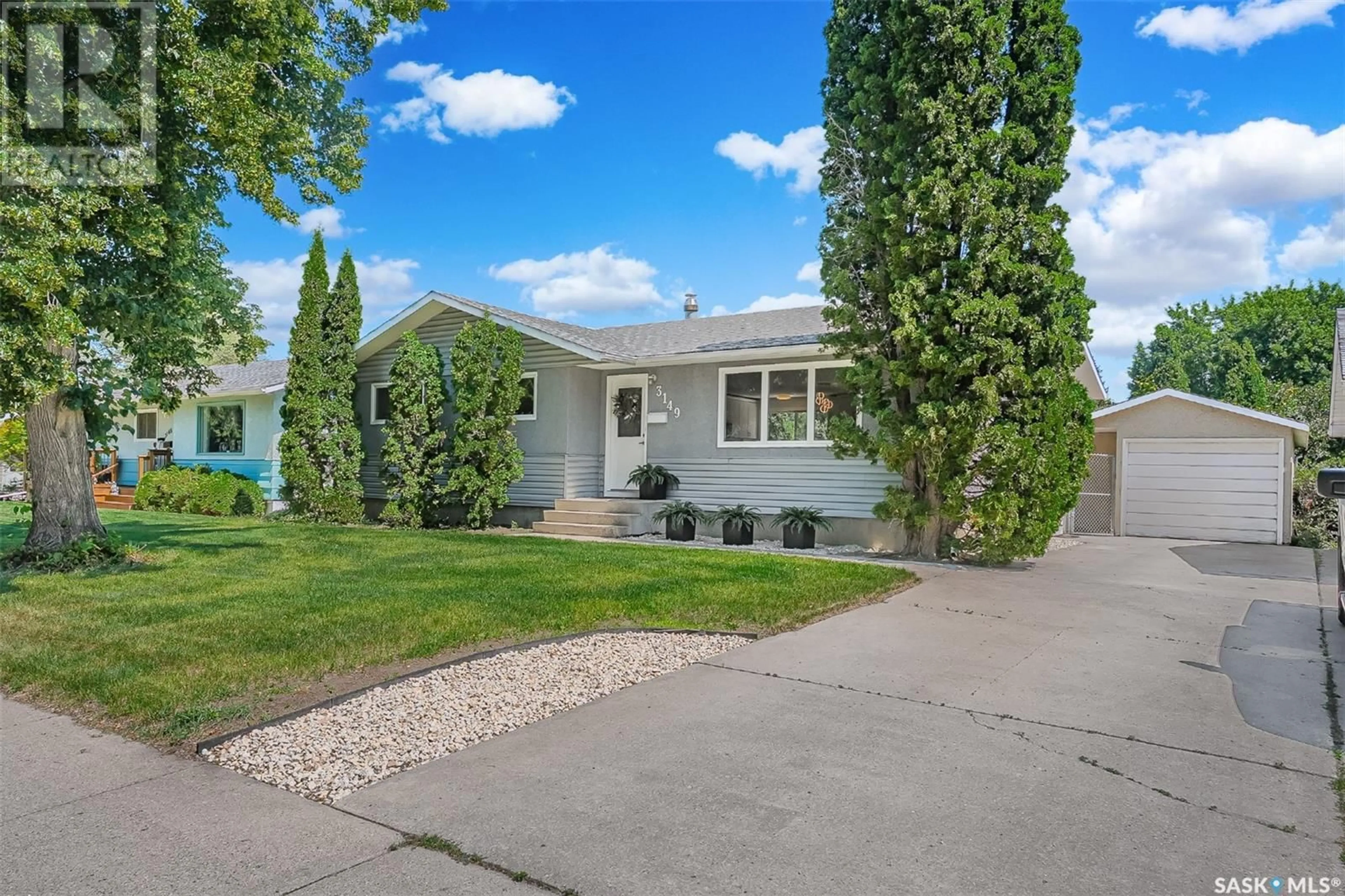 Home with vinyl exterior material, street for 3149 EASTVIEW, Saskatoon Saskatchewan S7J3J5