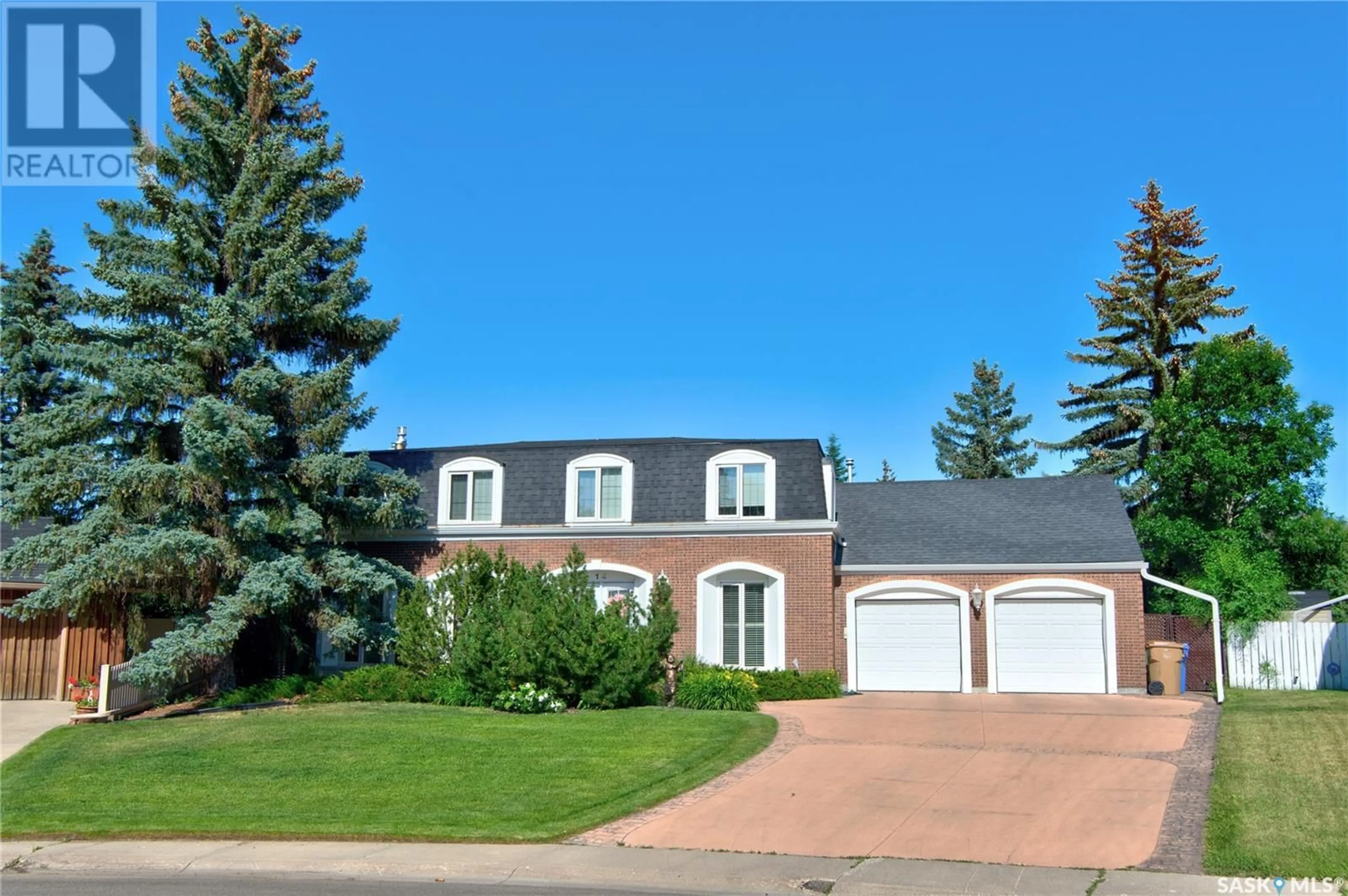 Home with vinyl exterior material, street for 14 LOWRY PLACE, Regina Saskatchewan S4S6C6