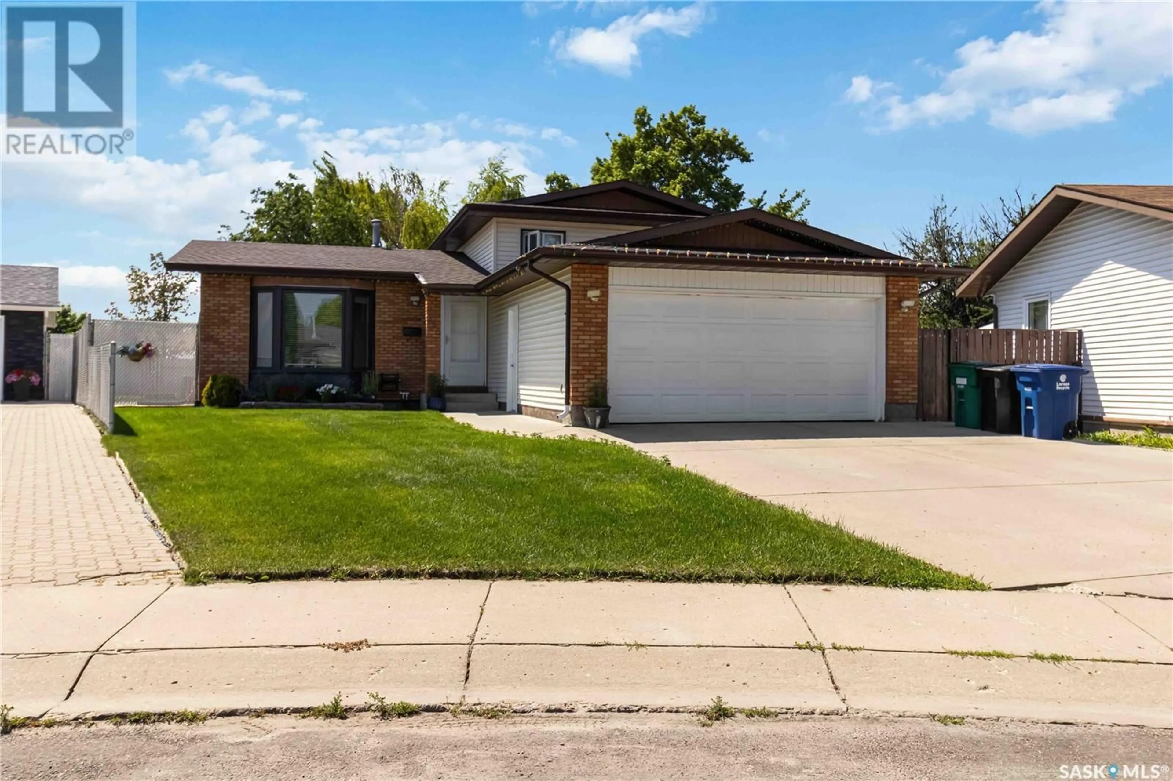 Home with brick exterior material, street for 315 SHERRY CRESCENT, Saskatoon Saskatchewan S7M5S1