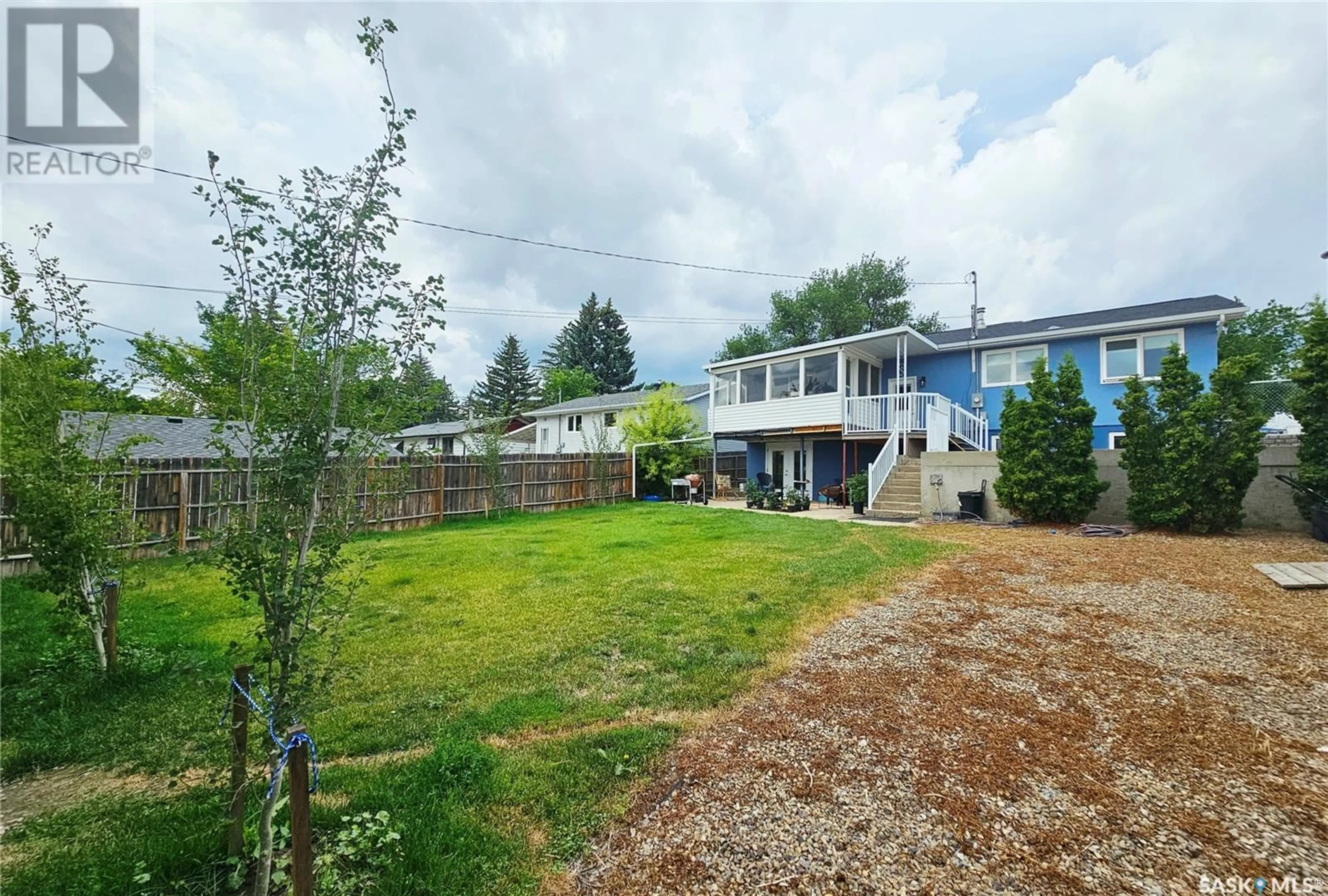 A pic from outside/outdoor area/front of a property/back of a property/a pic from drone, mountain view for E - 1660 BELL STREET, Swift Current Saskatchewan S9H1S7