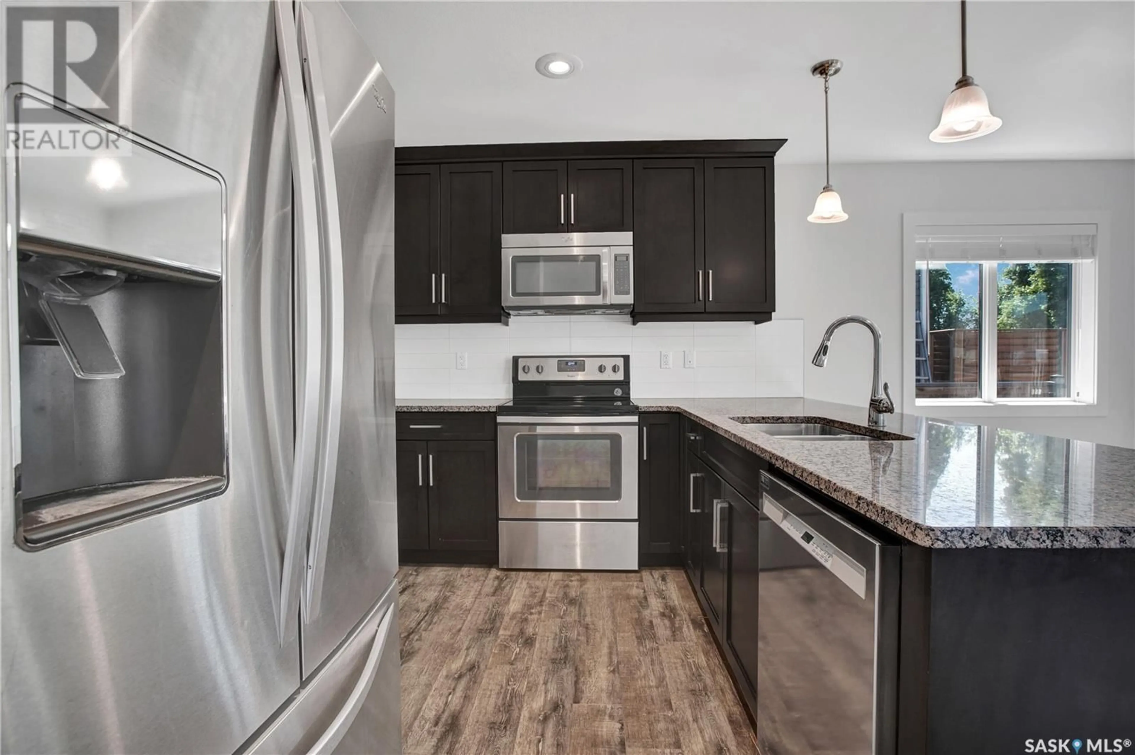 Open concept kitchen, ceramic/tile floor for 222 LEWIN CRESCENT, Saskatoon Saskatchewan S7T0T3
