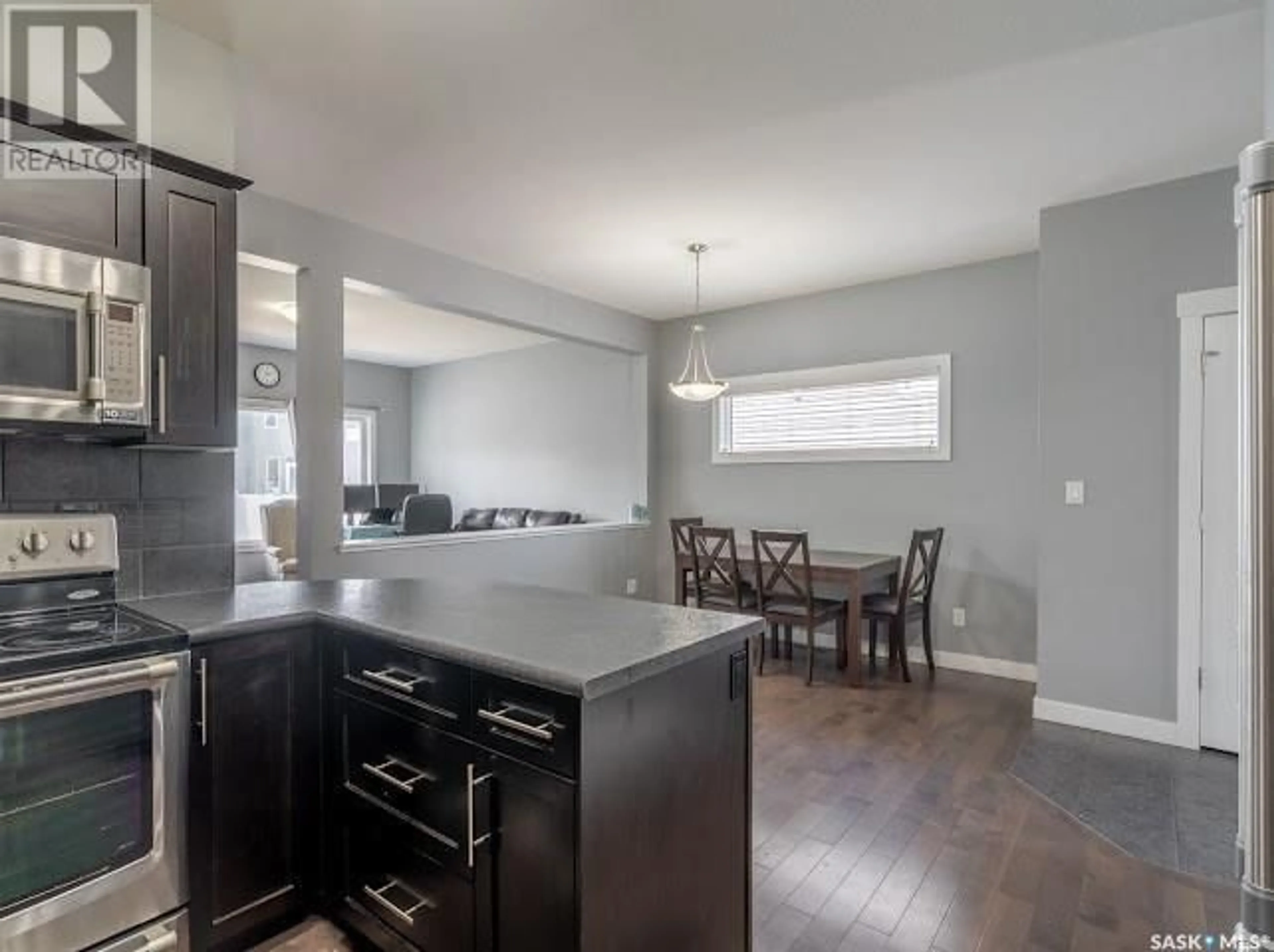 Open concept kitchen, unknown for E - 4809 GREEN ROCK ROAD, Regina Saskatchewan S4V3L1