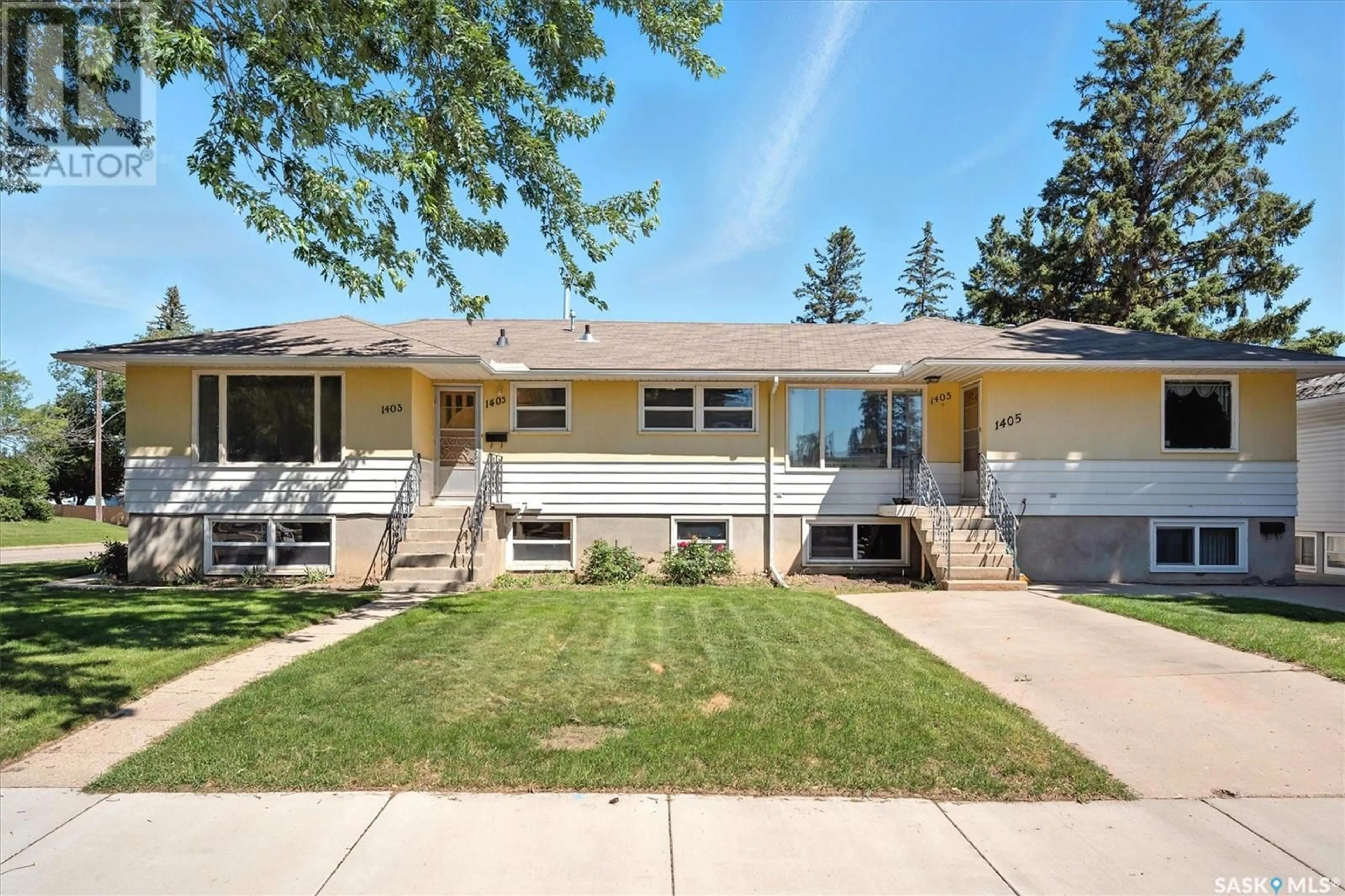 Home with vinyl exterior material, street for 1403/1405 11TH STREET, Saskatoon Saskatchewan S7H0G7