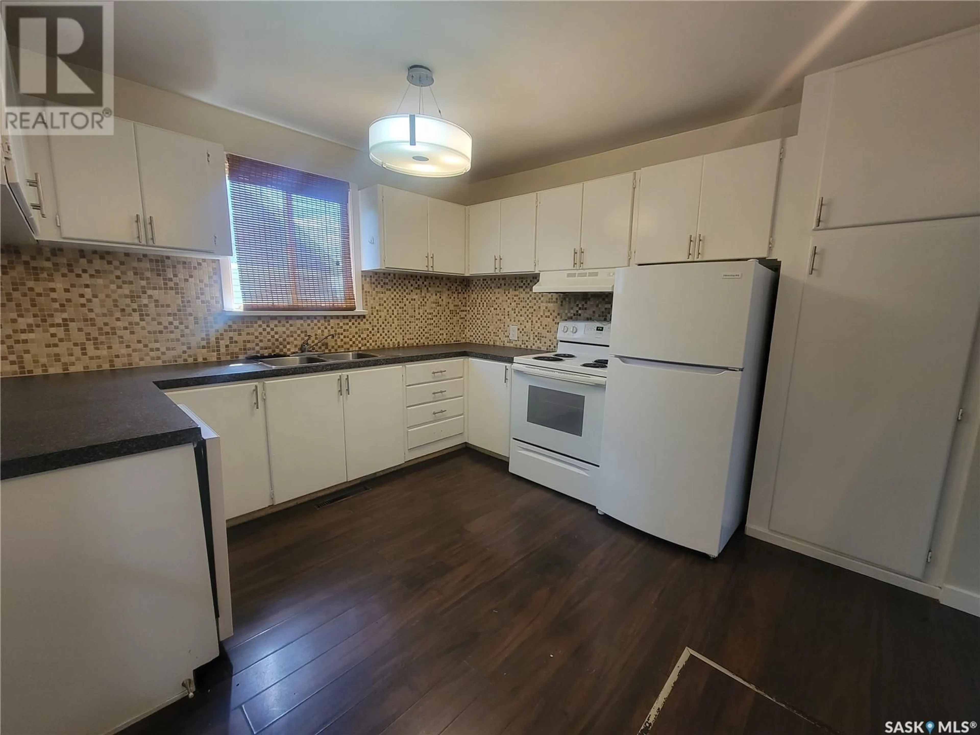 Standard kitchen, wood/laminate floor for 862 109TH STREET, North Battleford Saskatchewan S9A2C9