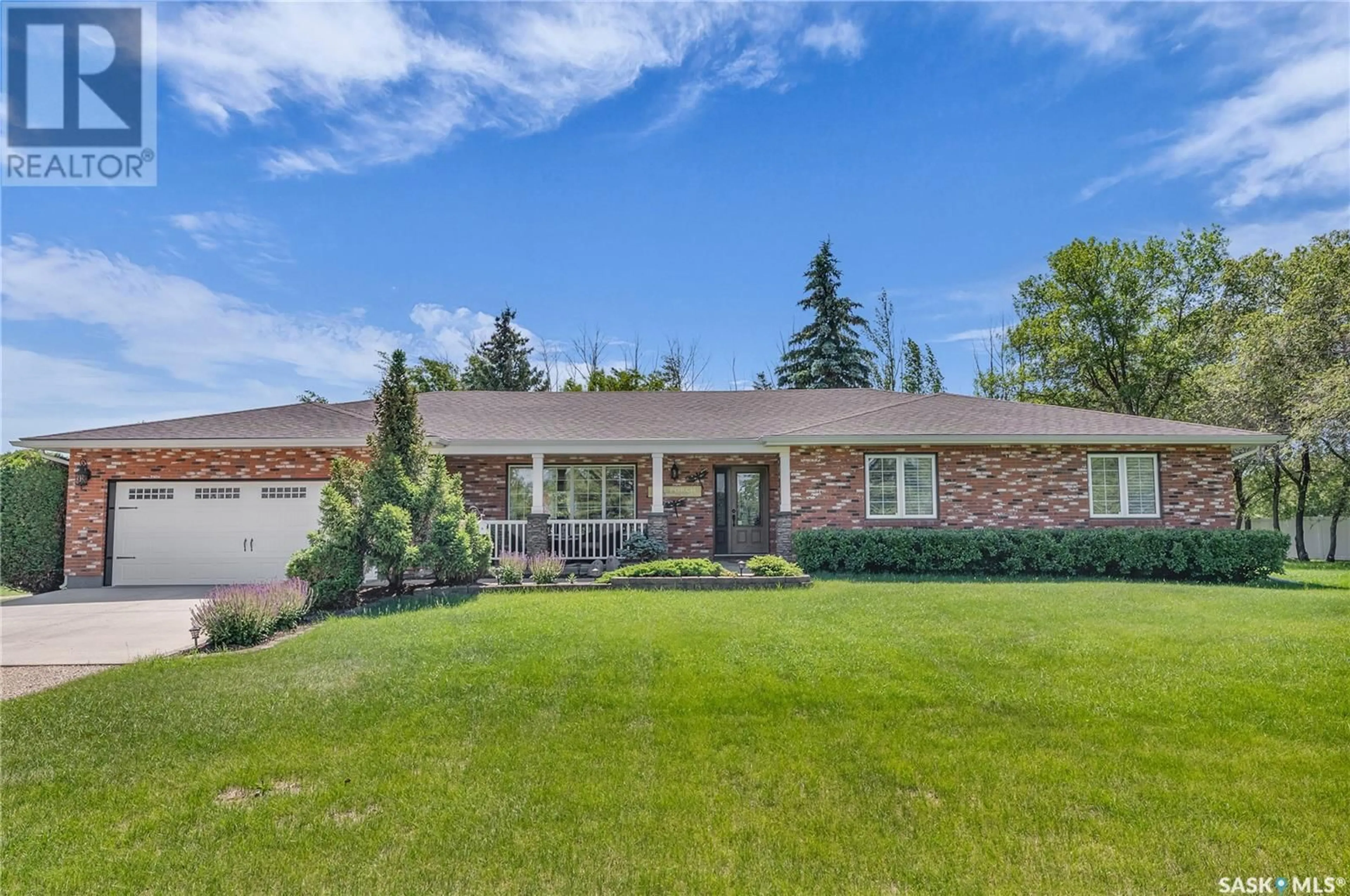 Home with brick exterior material, street for 5 HIGHWAY ACREAGE, Blucher Rm No. 343 Saskatchewan S0K3W0