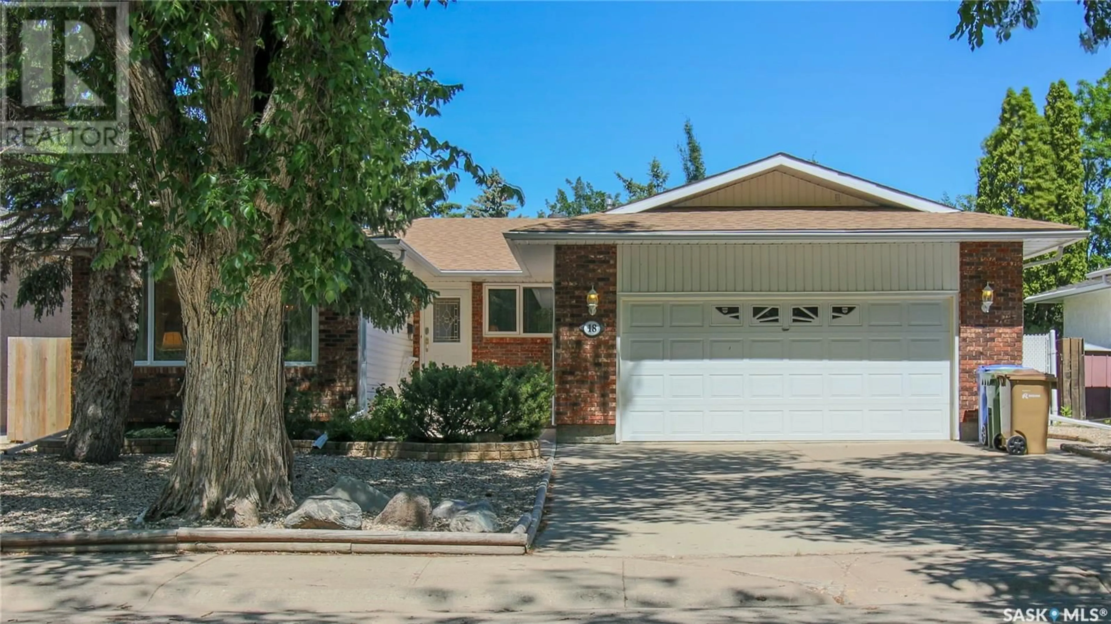 Home with vinyl exterior material, street for 18 RYAN ROAD, Regina Saskatchewan S4S6V9