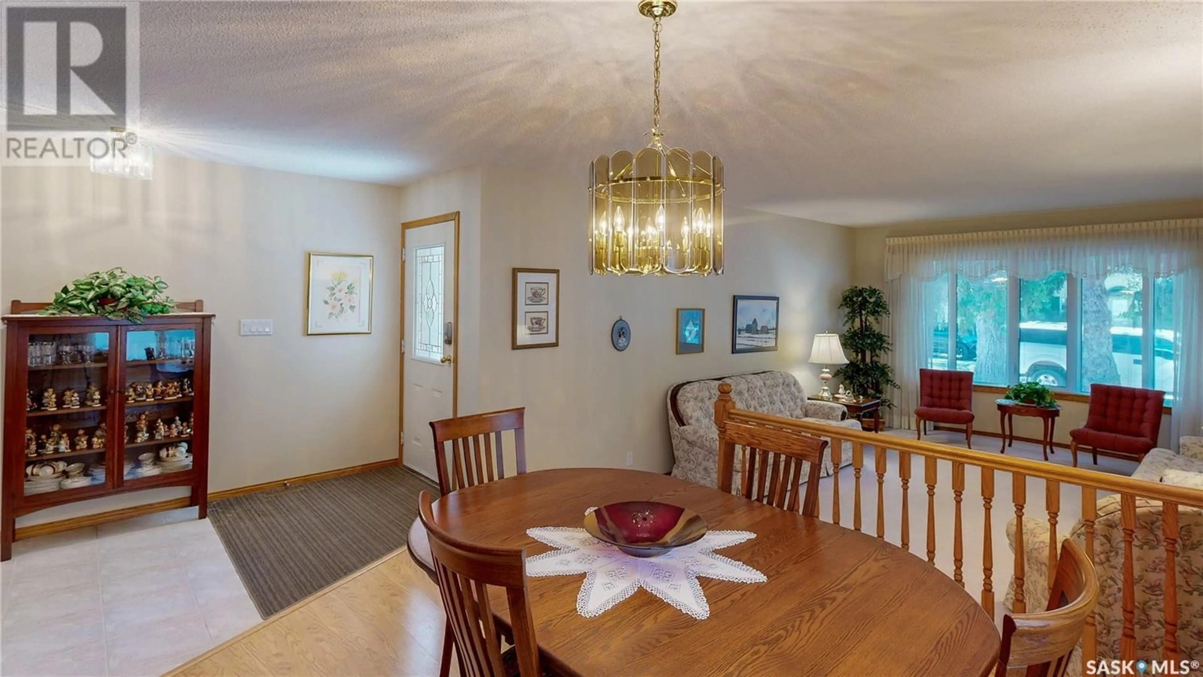 Dining room, wood/laminate floor for 18 RYAN ROAD, Regina Saskatchewan S4S6V9