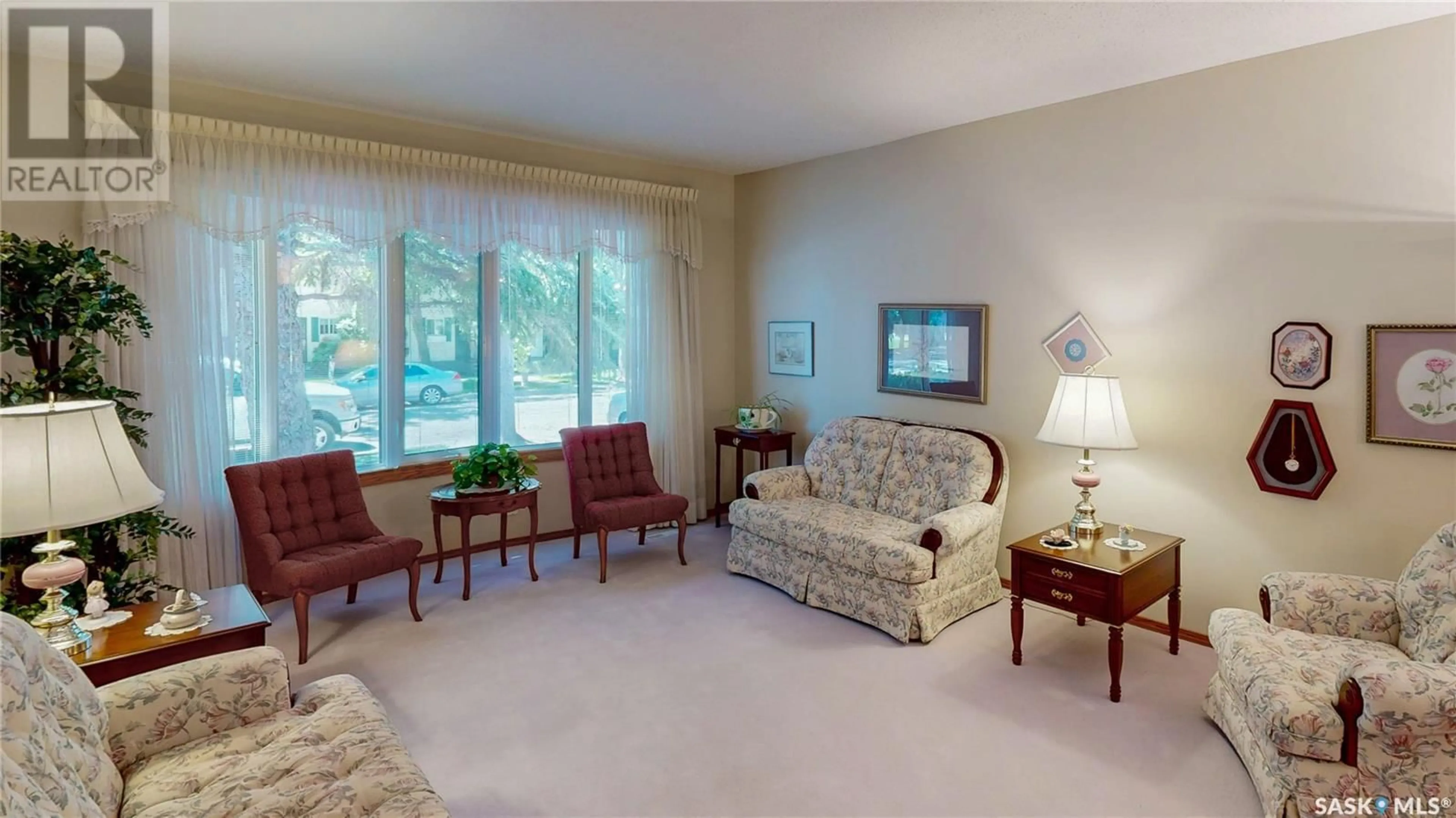 Living room with furniture, carpet floor for 18 RYAN ROAD, Regina Saskatchewan S4S6V9