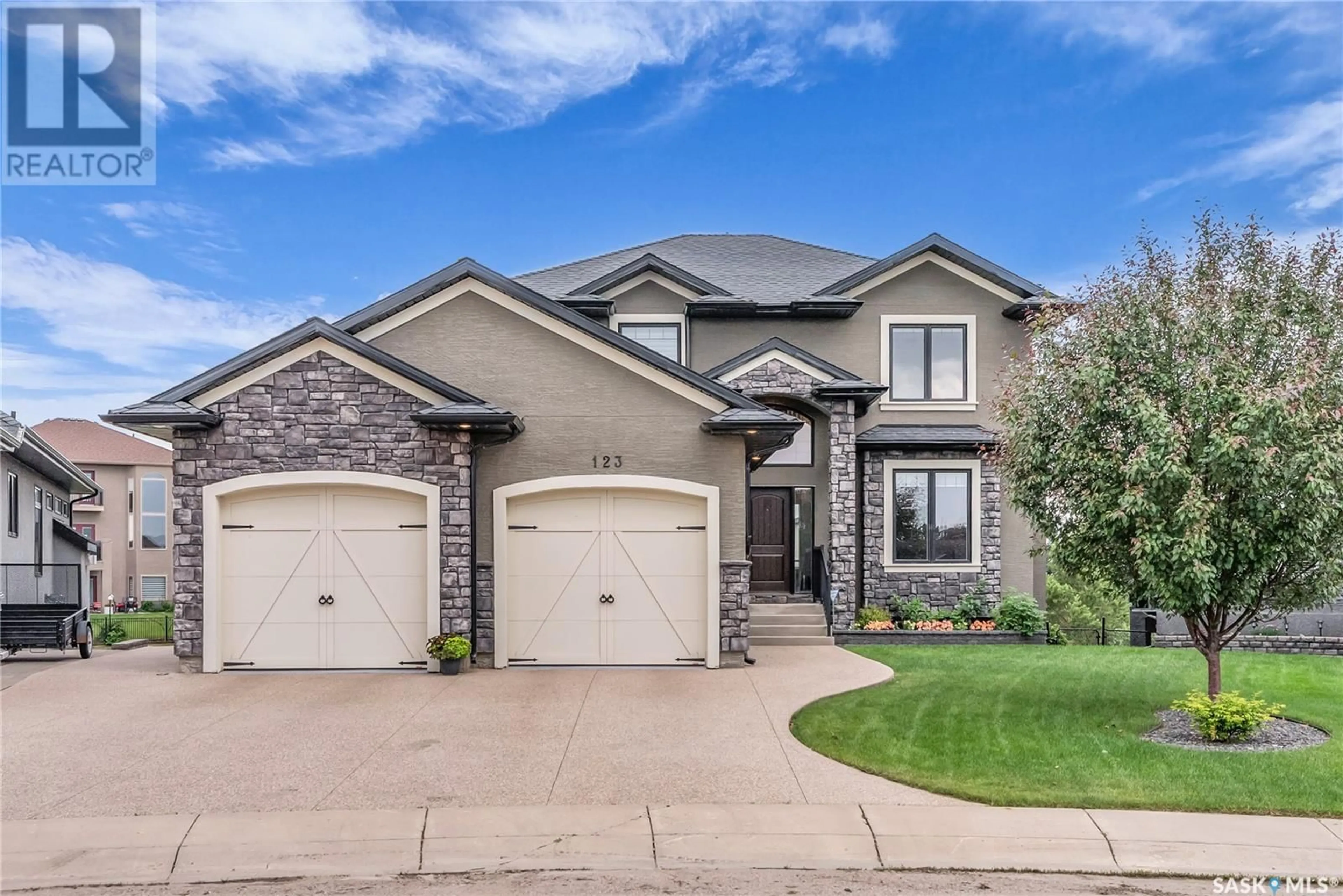 Home with brick exterior material, street for 123 FLEMING CRESCENT, Saskatoon Saskatchewan S7W0E7