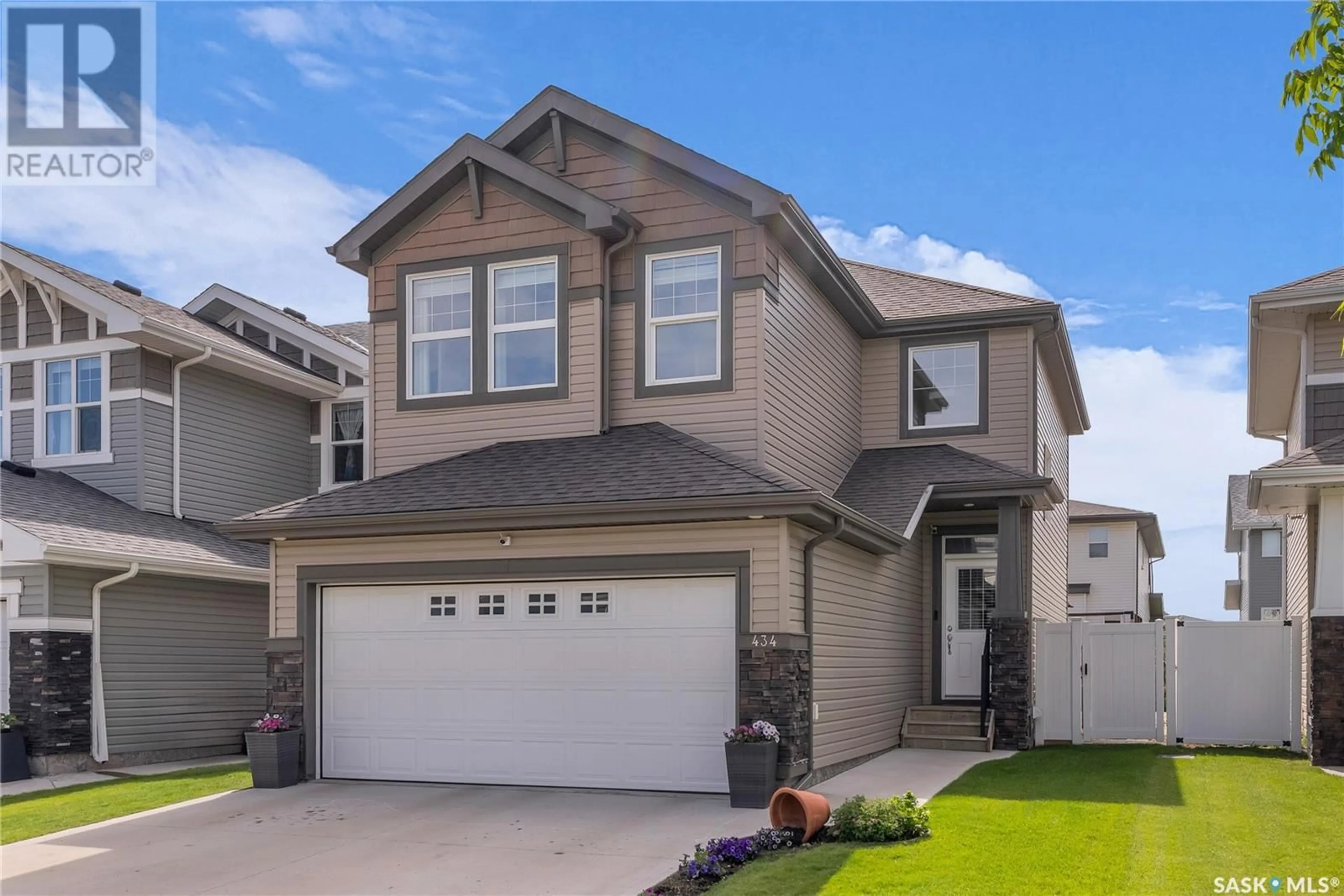 Home with vinyl exterior material, street for 434 SECORD WAY, Saskatoon Saskatchewan S7V0M1