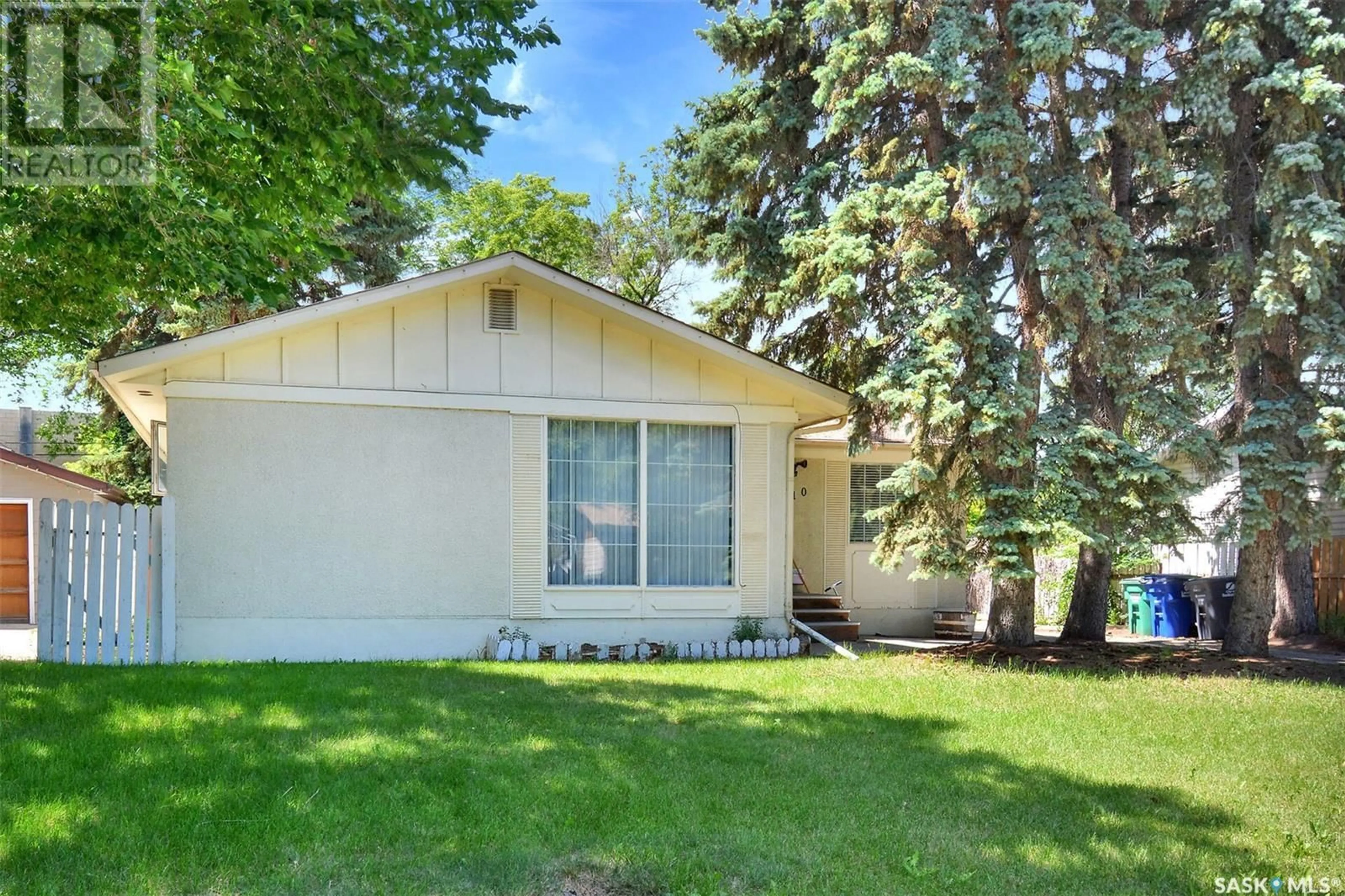 Home with vinyl exterior material, street for 110 SPINKS DRIVE, Saskatoon Saskatchewan S7H4B9