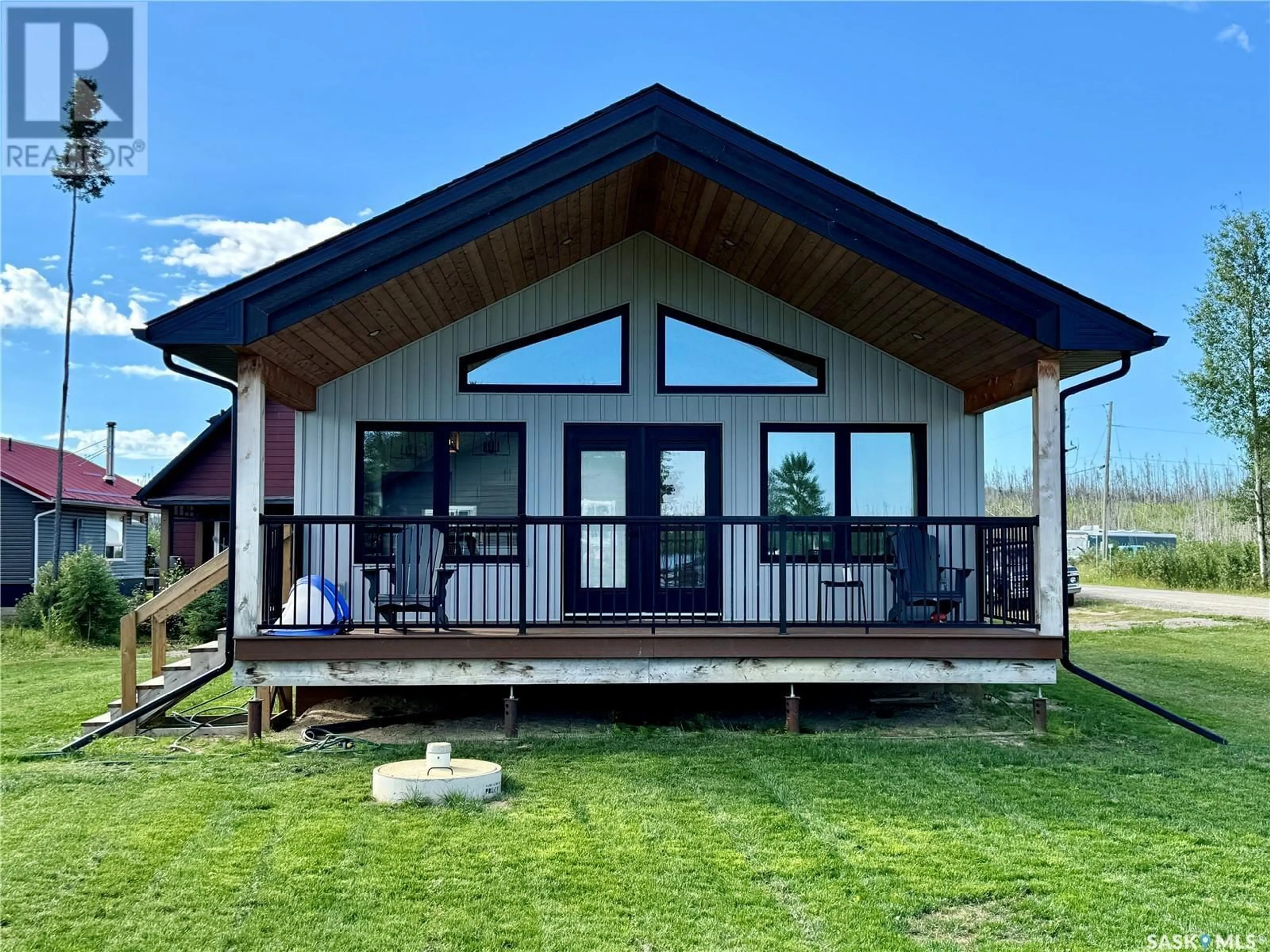 A pic from outside/outdoor area/front of a property/back of a property/a pic from drone, unknown for 900 SANDY SHORE ROAD, Northern Admin District Saskatchewan S0J1L0