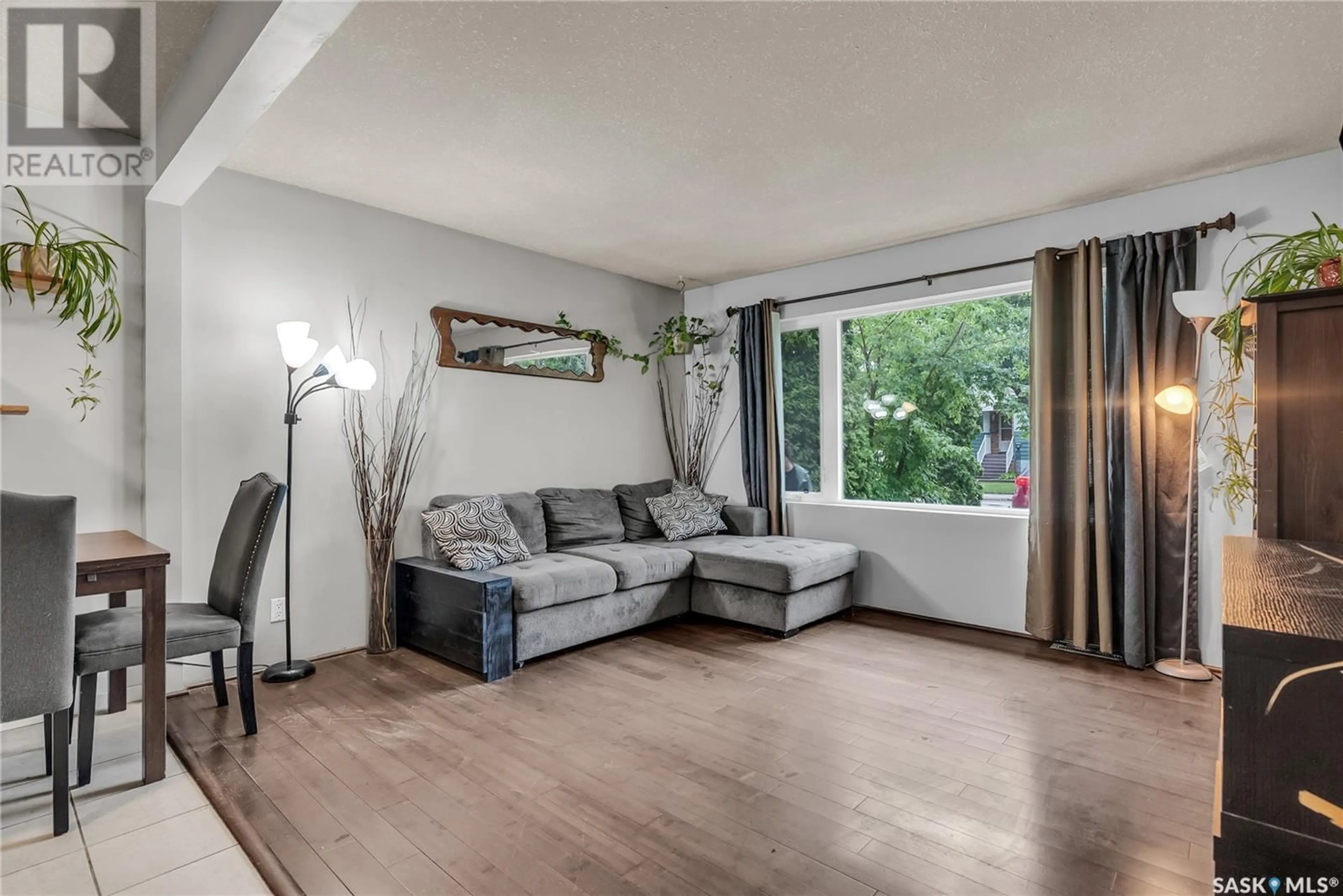 Living room with furniture, wood/laminate floor for N - 1726 1ST AVENUE, Saskatoon Saskatchewan S7K1Z6
