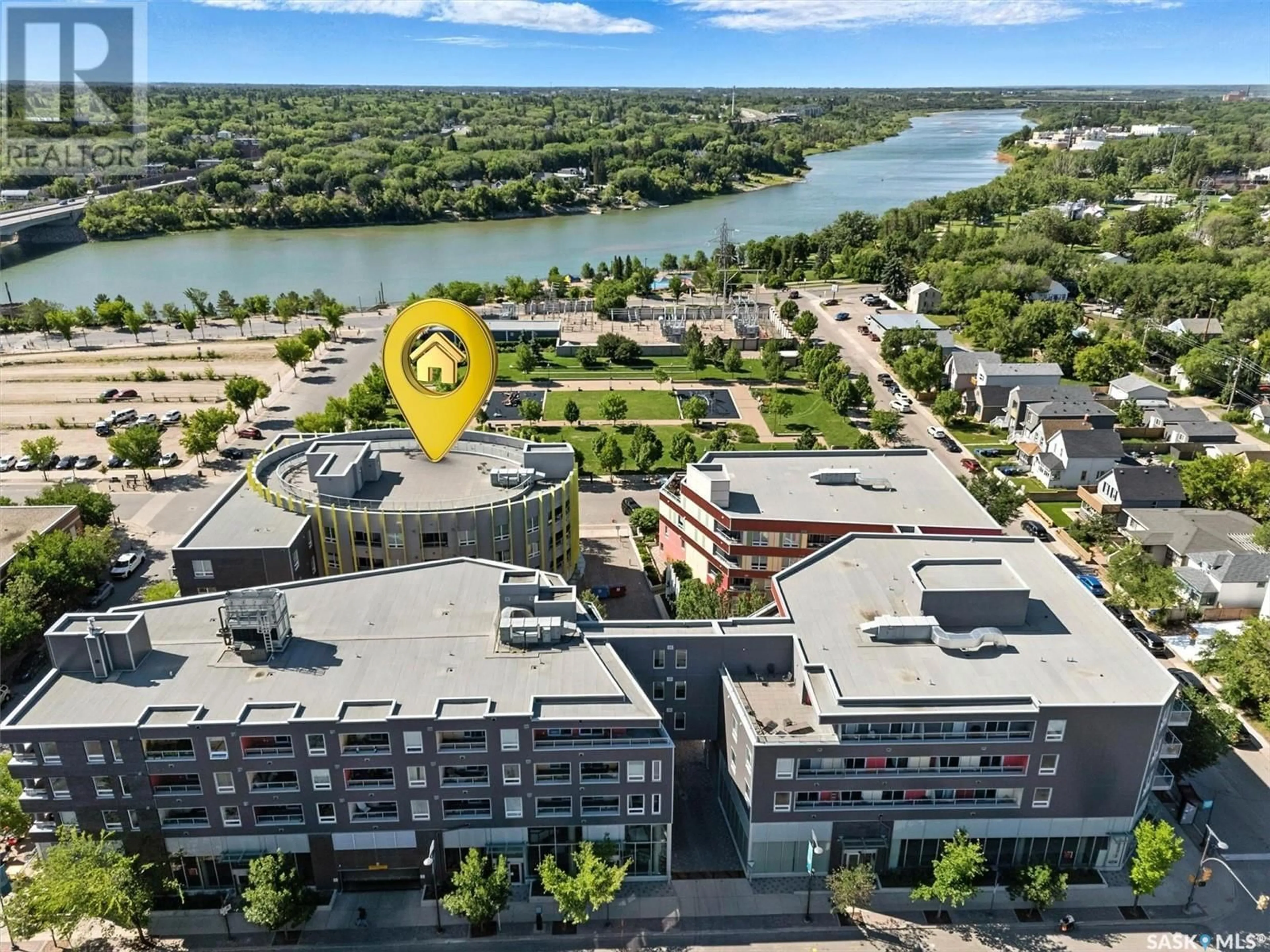 A pic from outside/outdoor area/front of a property/back of a property/a pic from drone, water/lake/river/ocean view for 409 - 401 B AVENUE S, Saskatoon Saskatchewan S7M5M8