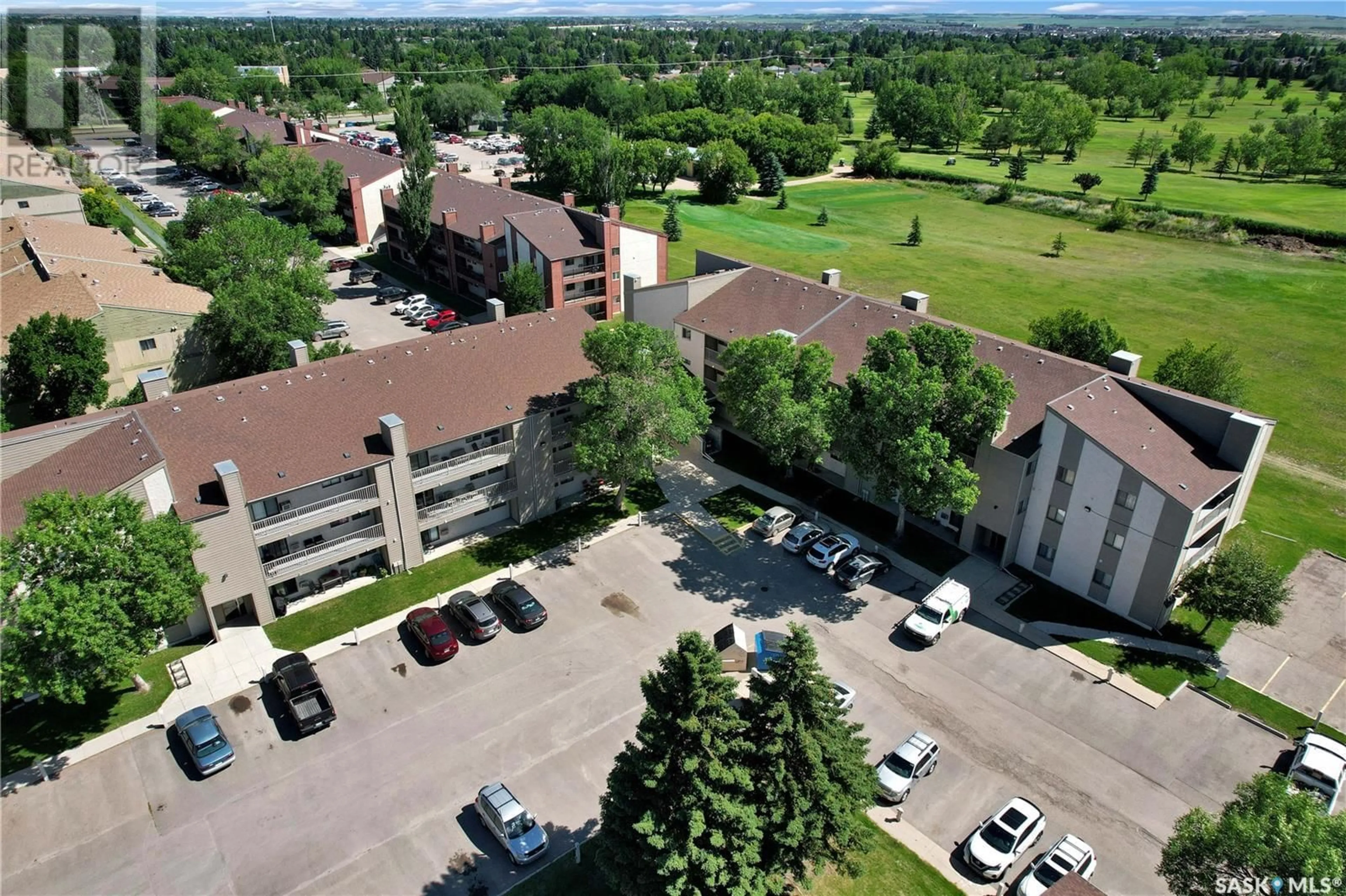 A pic from outside/outdoor area/front of a property/back of a property/a pic from drone, mountain view for 207 - 306 TAIT PLACE, Saskatoon Saskatchewan S7H5L8