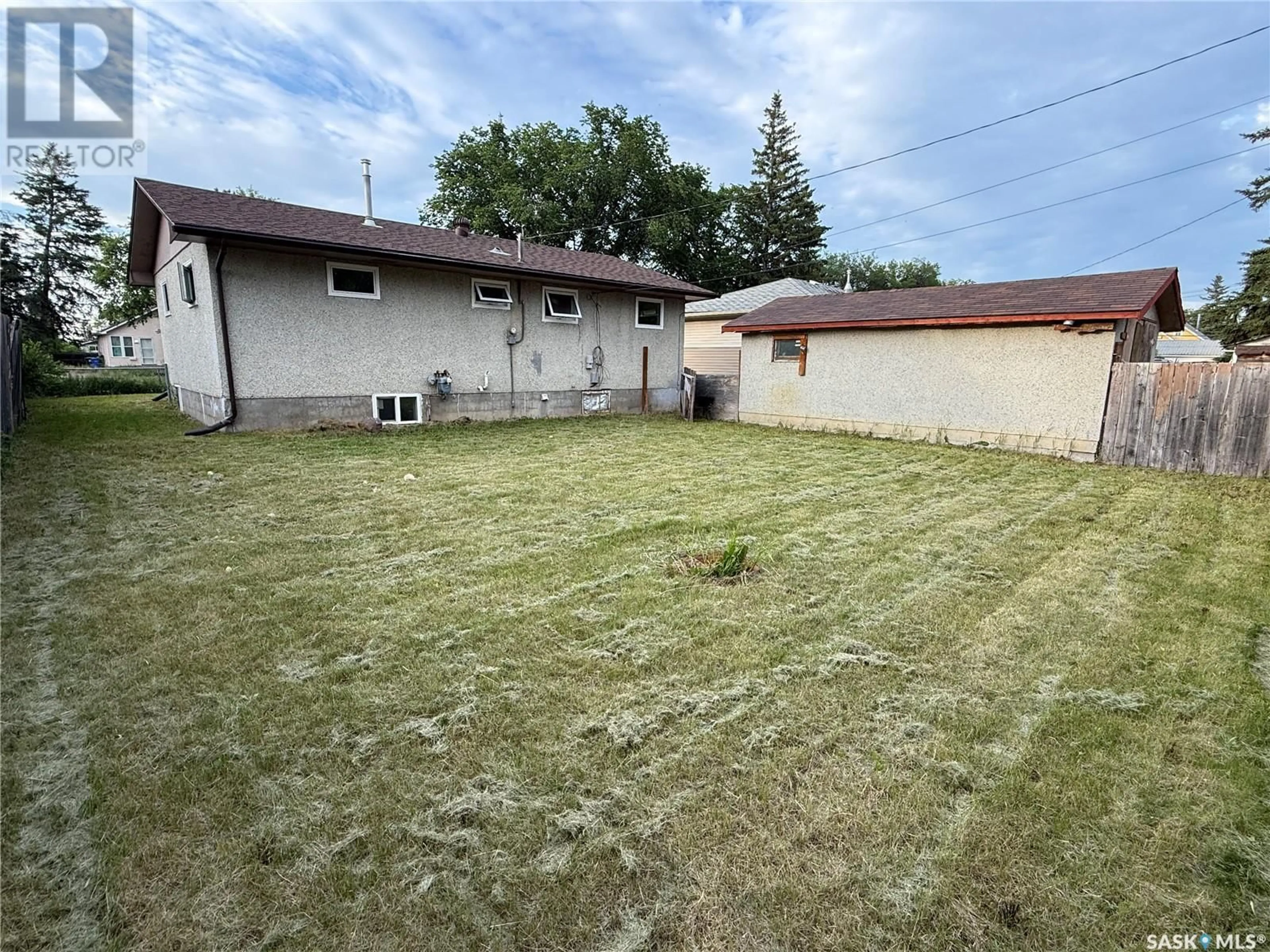 A pic from outside/outdoor area/front of a property/back of a property/a pic from drone, street for 1835 15TH STREET, Prince Albert Saskatchewan S6V3T8