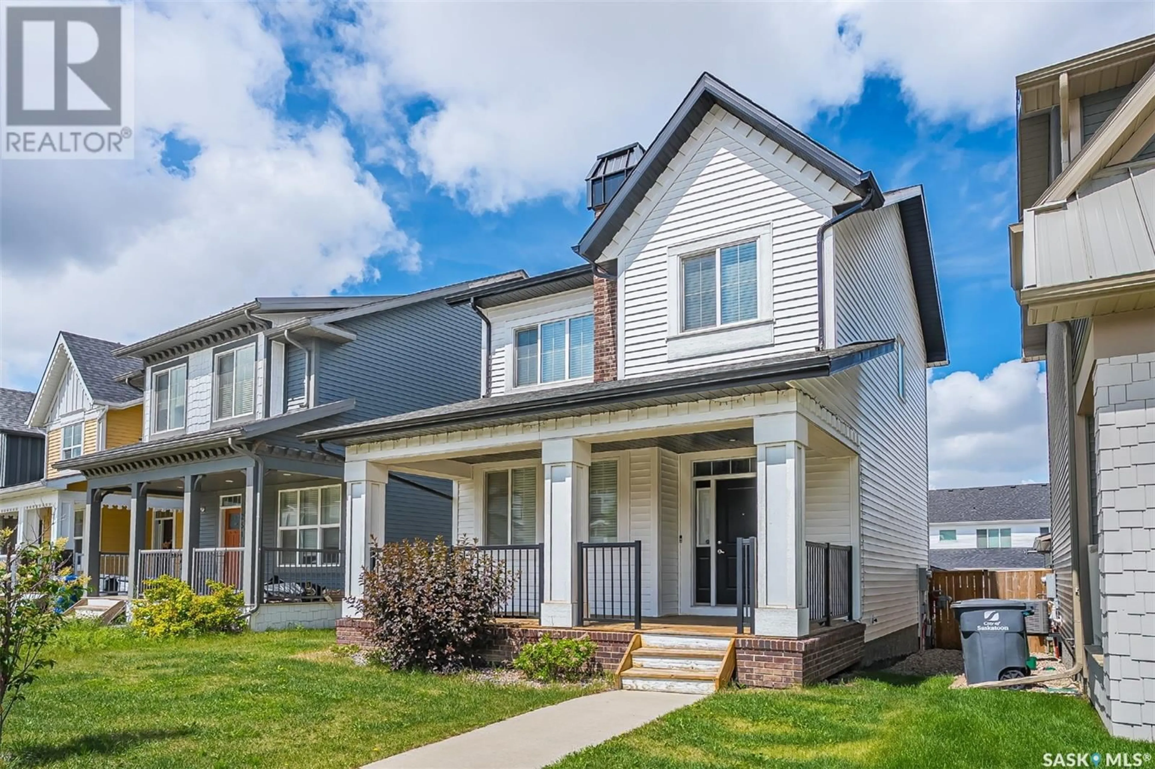 Home with vinyl exterior material, street for 247 NEWTON LINK, Saskatoon Saskatchewan S7V0M8