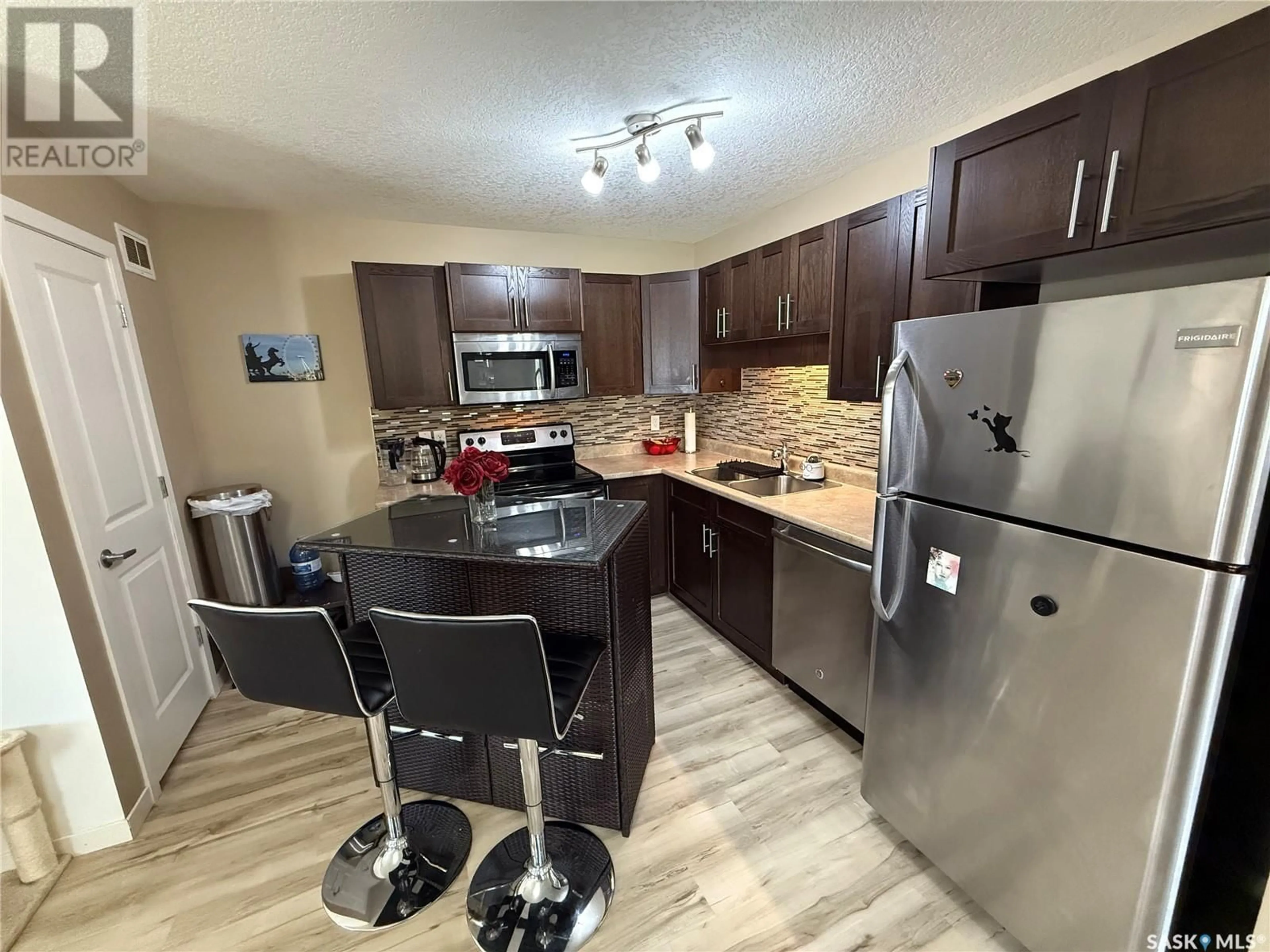 Open concept kitchen, unknown for 42 - 5541 BLAKE CRESCENT, Regina Saskatchewan S4X0J1