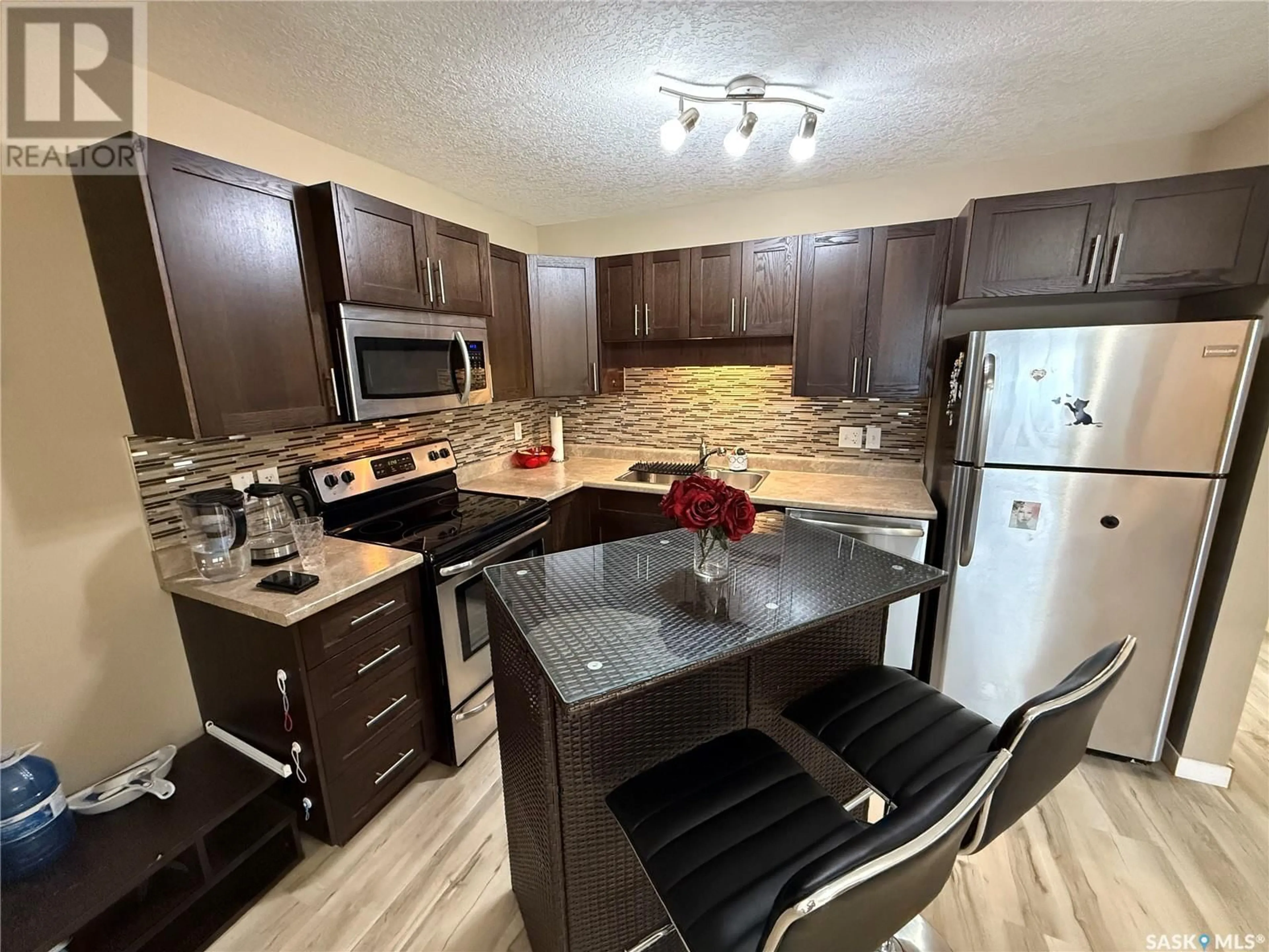 Open concept kitchen, unknown for 42 - 5541 BLAKE CRESCENT, Regina Saskatchewan S4X0J1