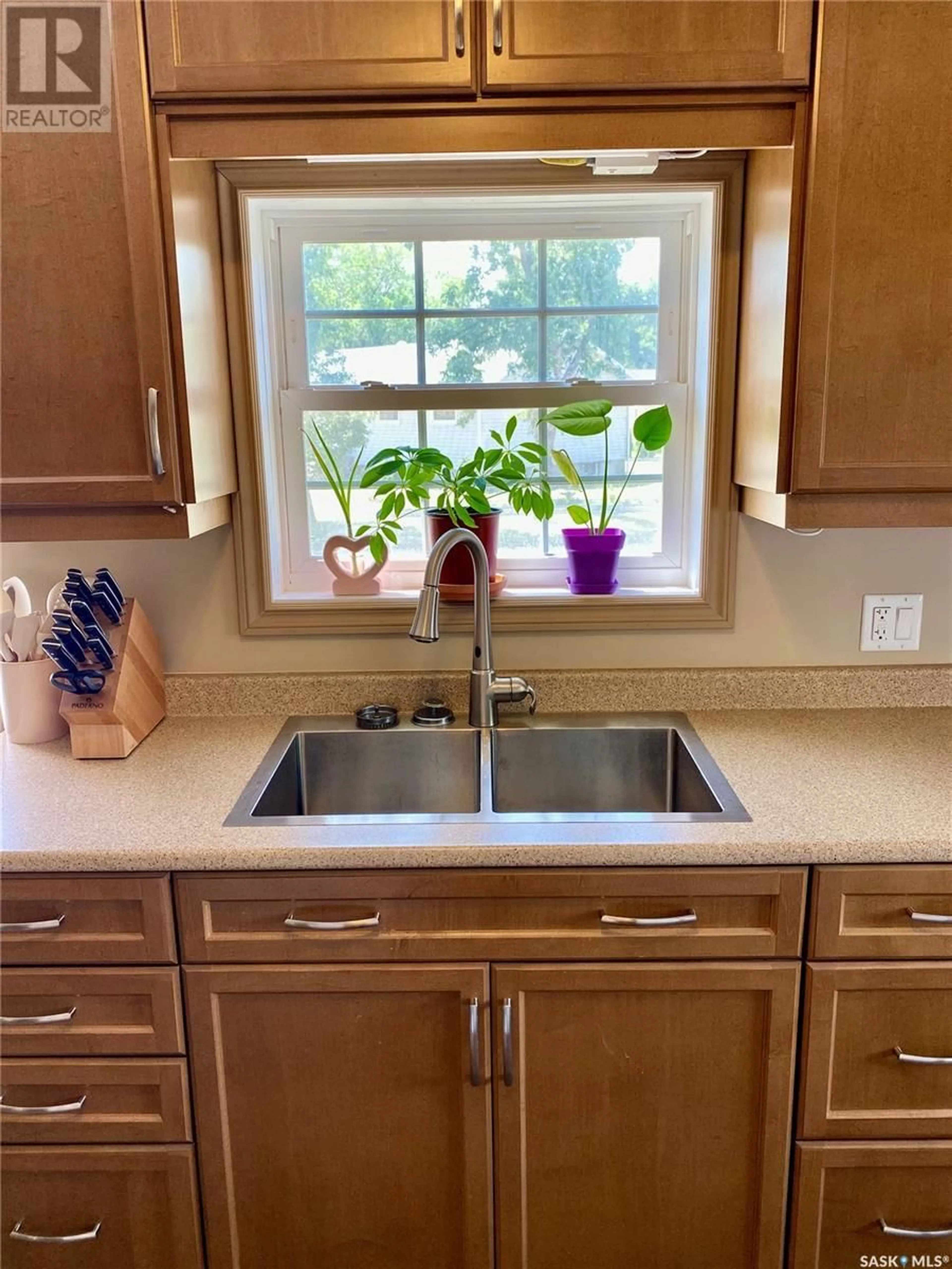 Contemporary kitchen, ceramic/tile floor for 120 3RD STREET, Carnduff Saskatchewan S0C0S0
