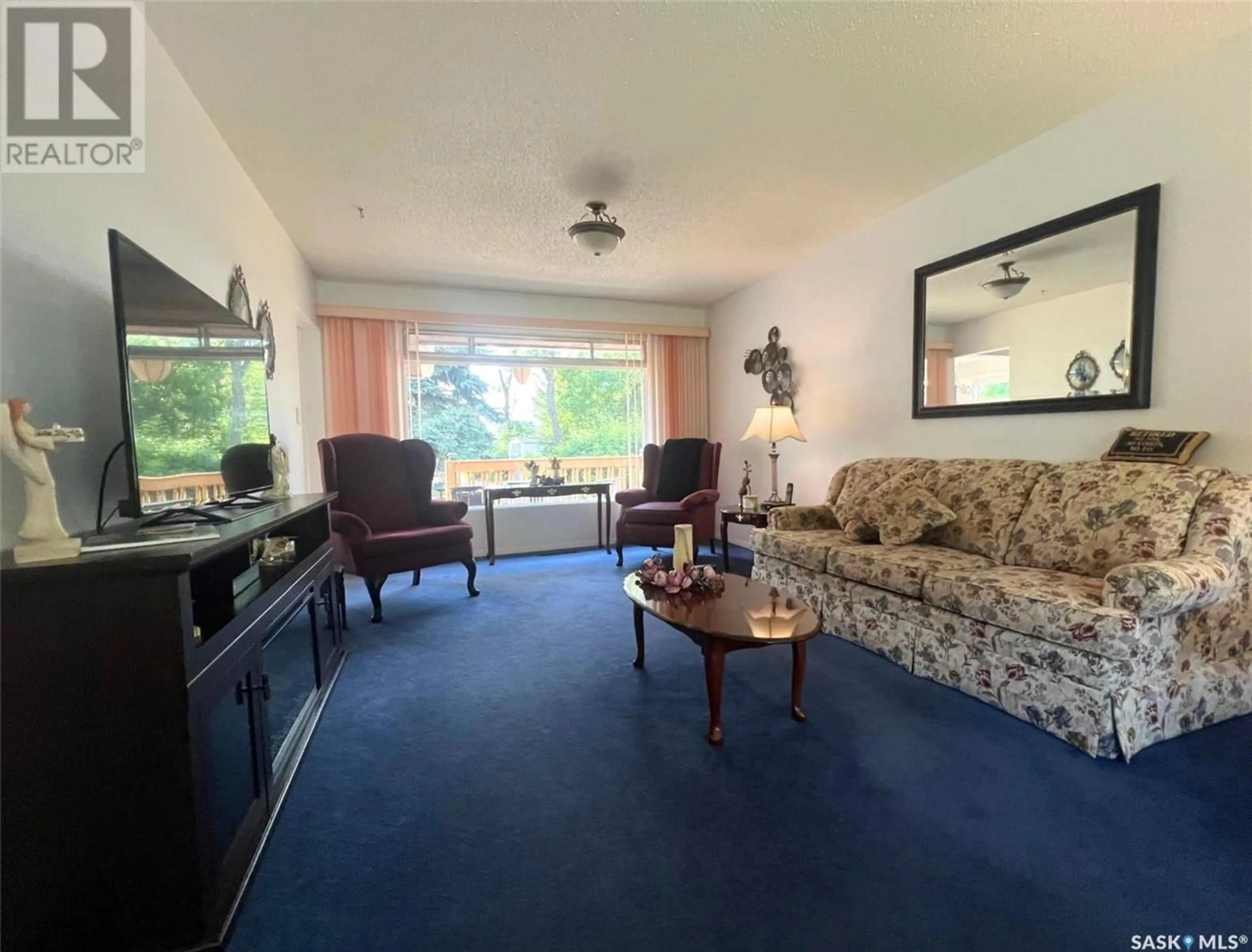 Living room with furniture, unknown for 552 GREY STREET E, Swift Current Saskatchewan S9H1W7