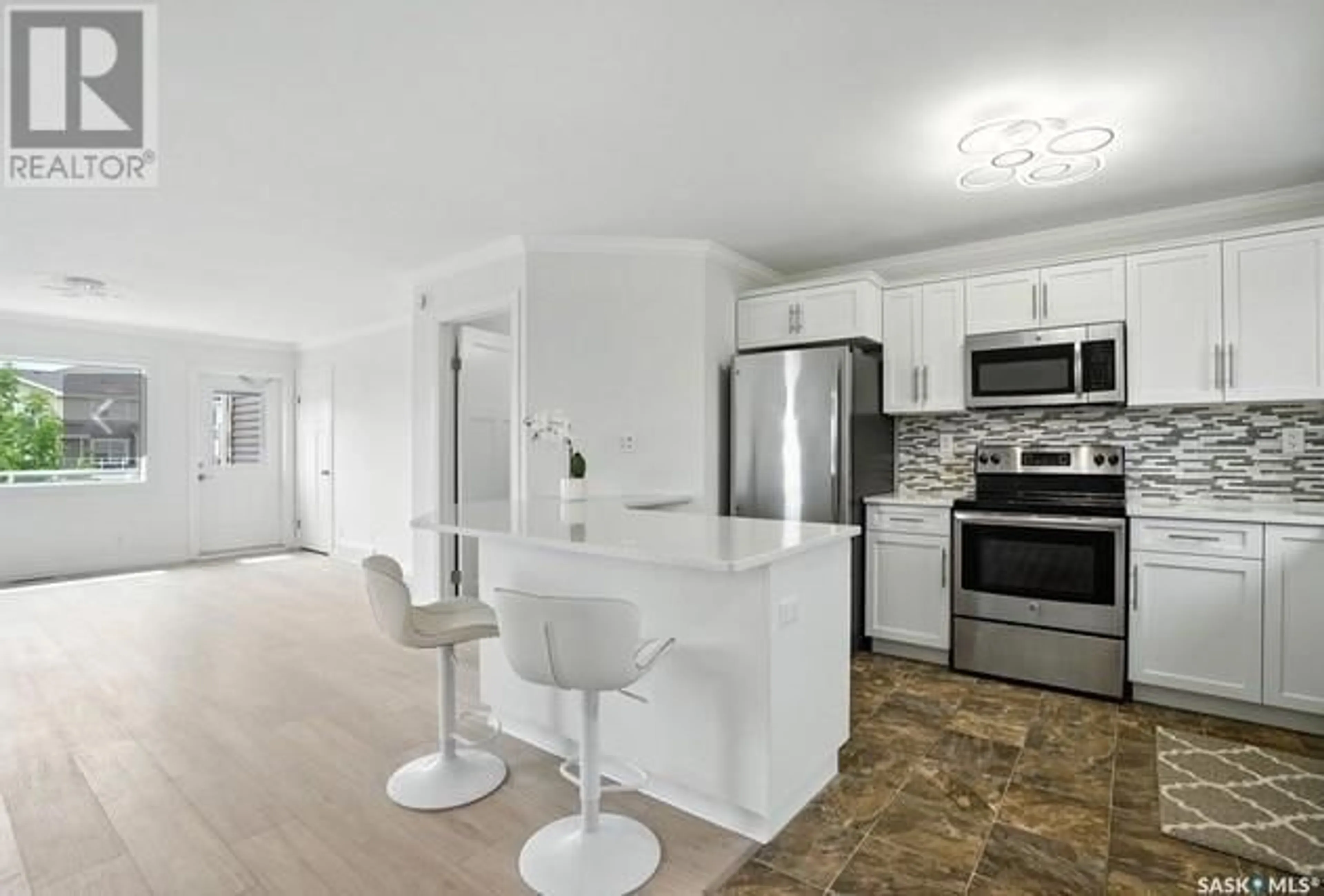 Open concept kitchen, unknown for 302 225 HASSARD CLOSE, Saskatoon Saskatchewan S7L2W3