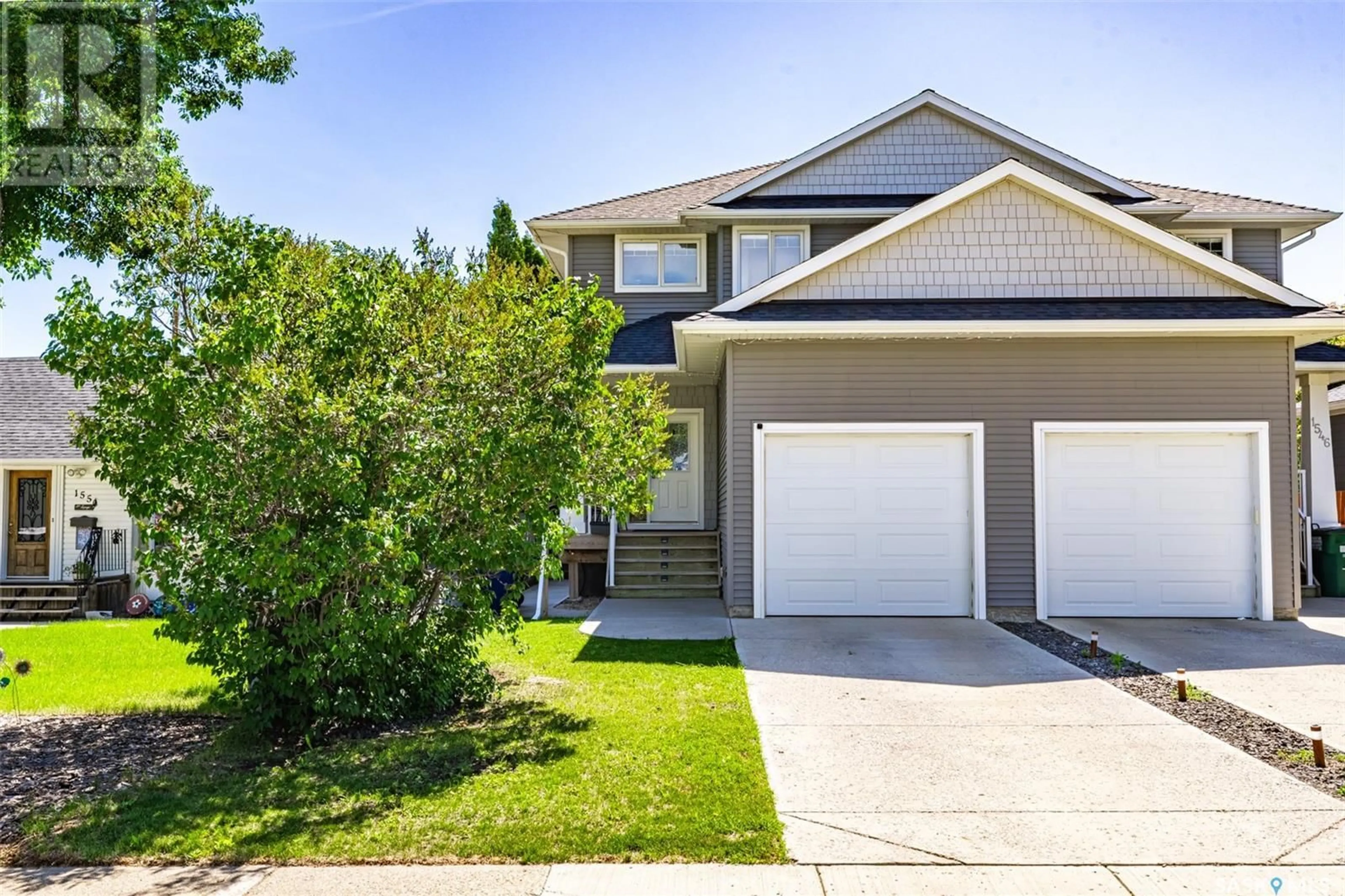 Home with vinyl exterior material, street for 1548 EMPRESS AVENUE, Saskatoon Saskatchewan S7K3G3