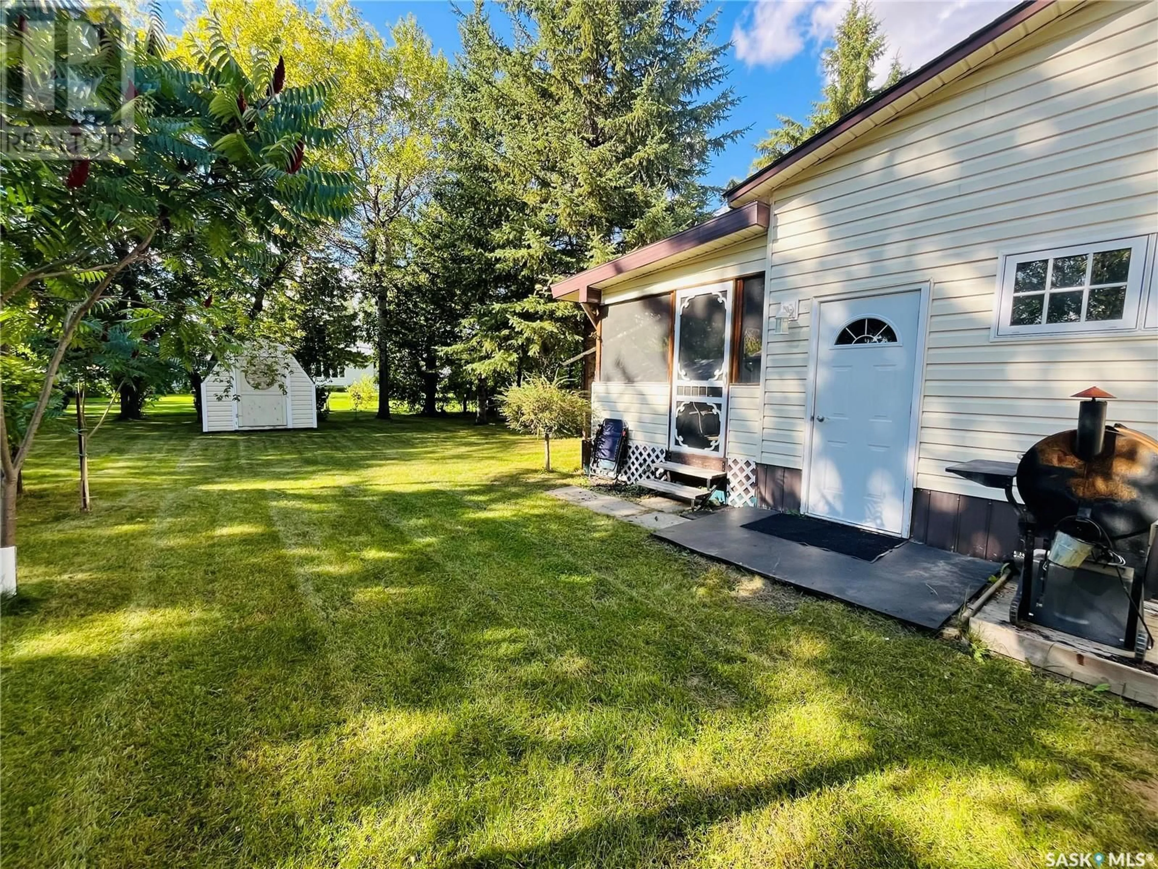 A pic from outside/outdoor area/front of a property/back of a property/a pic from drone, unknown for 1122 MAIN STREET, Moosomin Saskatchewan S0G3N0