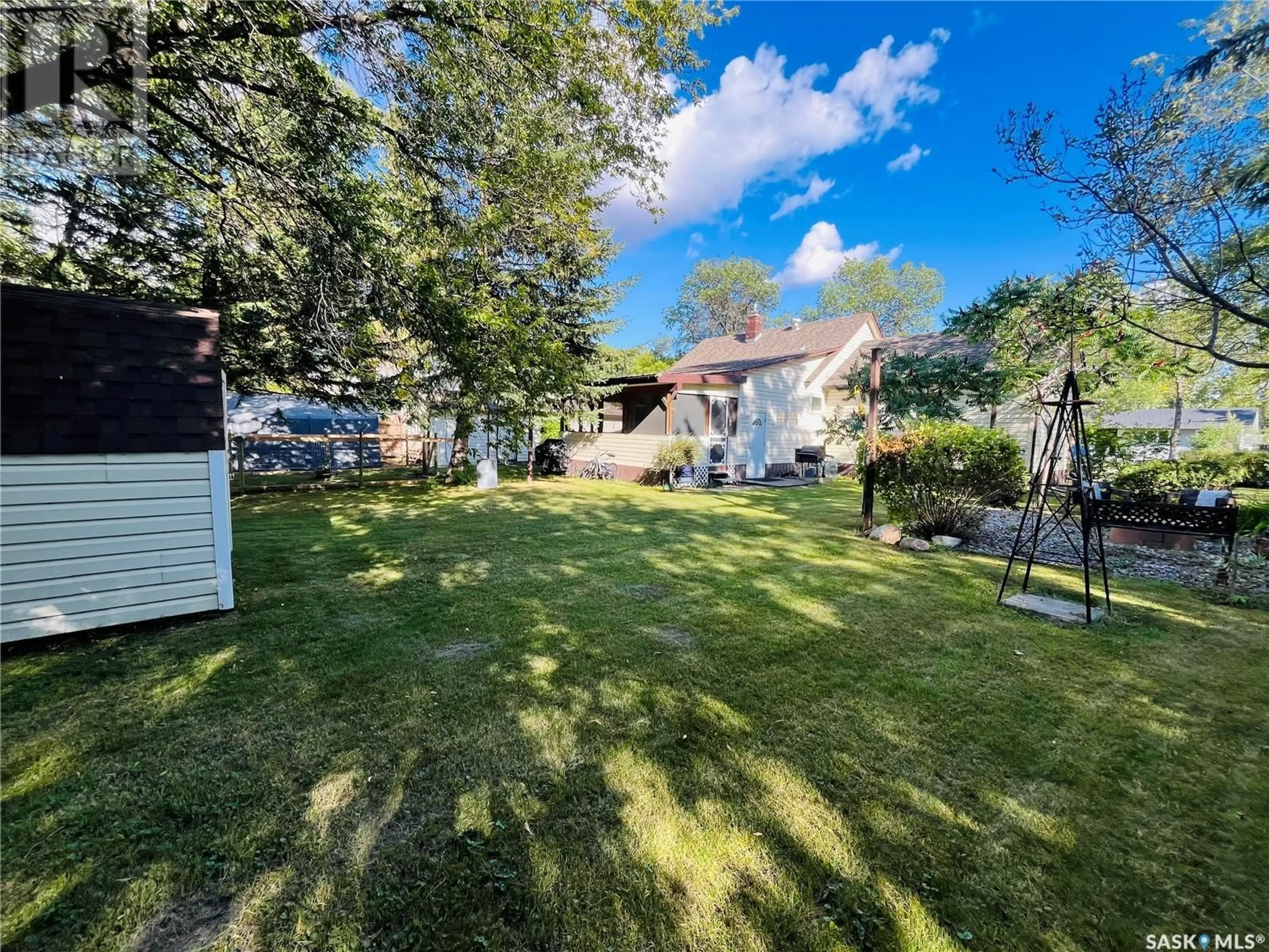 A pic from outside/outdoor area/front of a property/back of a property/a pic from drone, street for 1122 MAIN STREET, Moosomin Saskatchewan S0G3N0