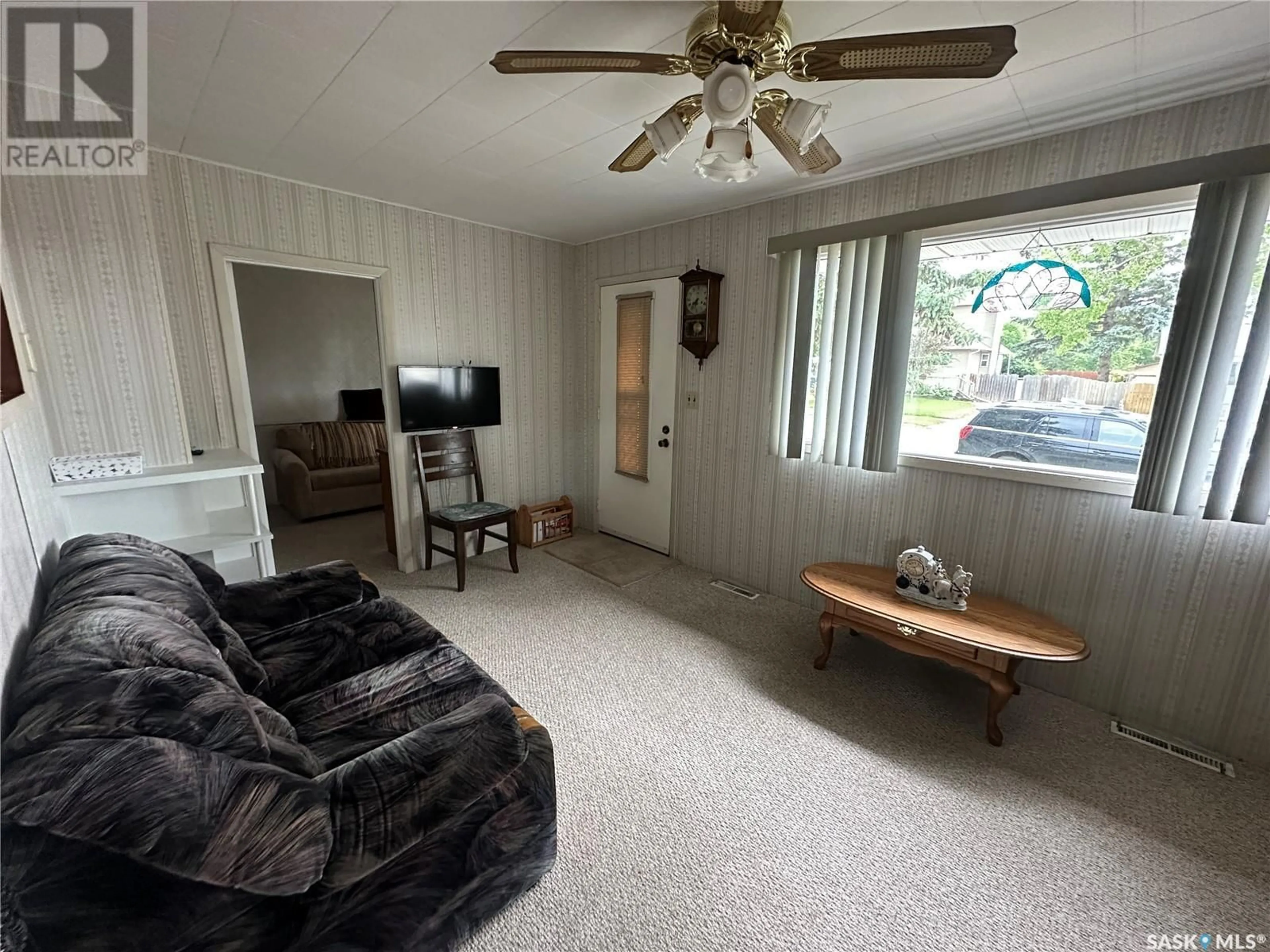 Living room with furniture, unknown for 55 12TH STREET, Weyburn Saskatchewan S4H1K4