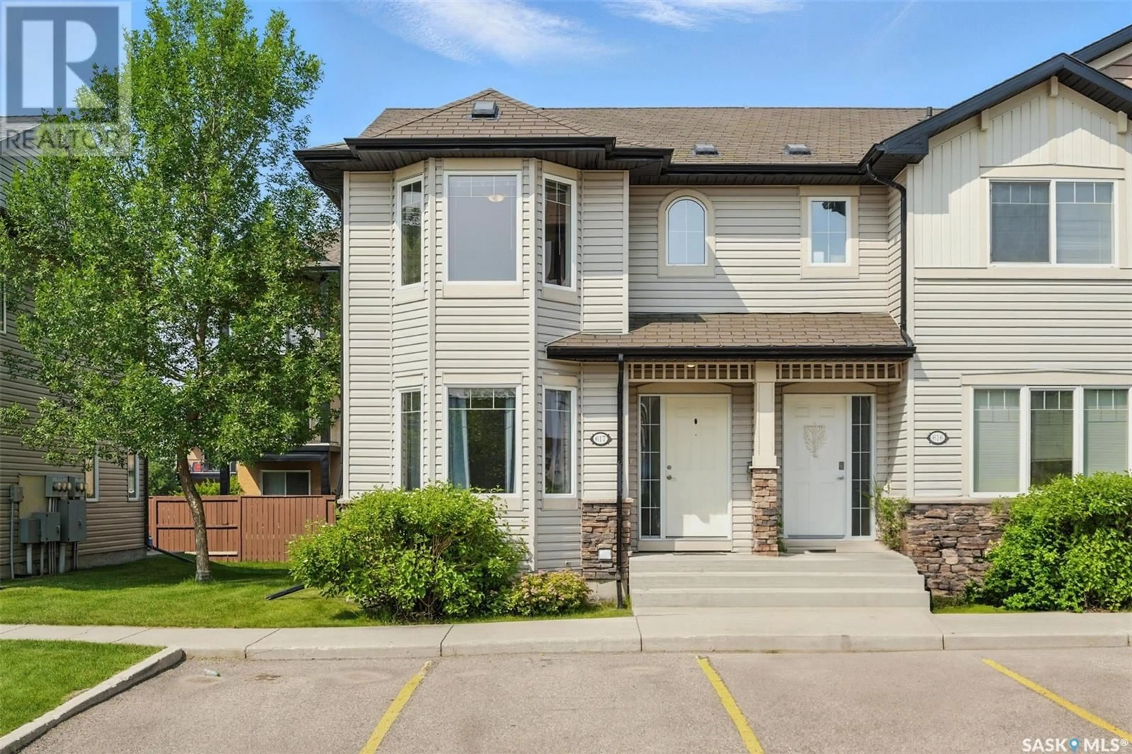 Home with brick exterior material, street for 303 - 617 SLIMMON PLACE, Saskatoon Saskatchewan S7V0A2