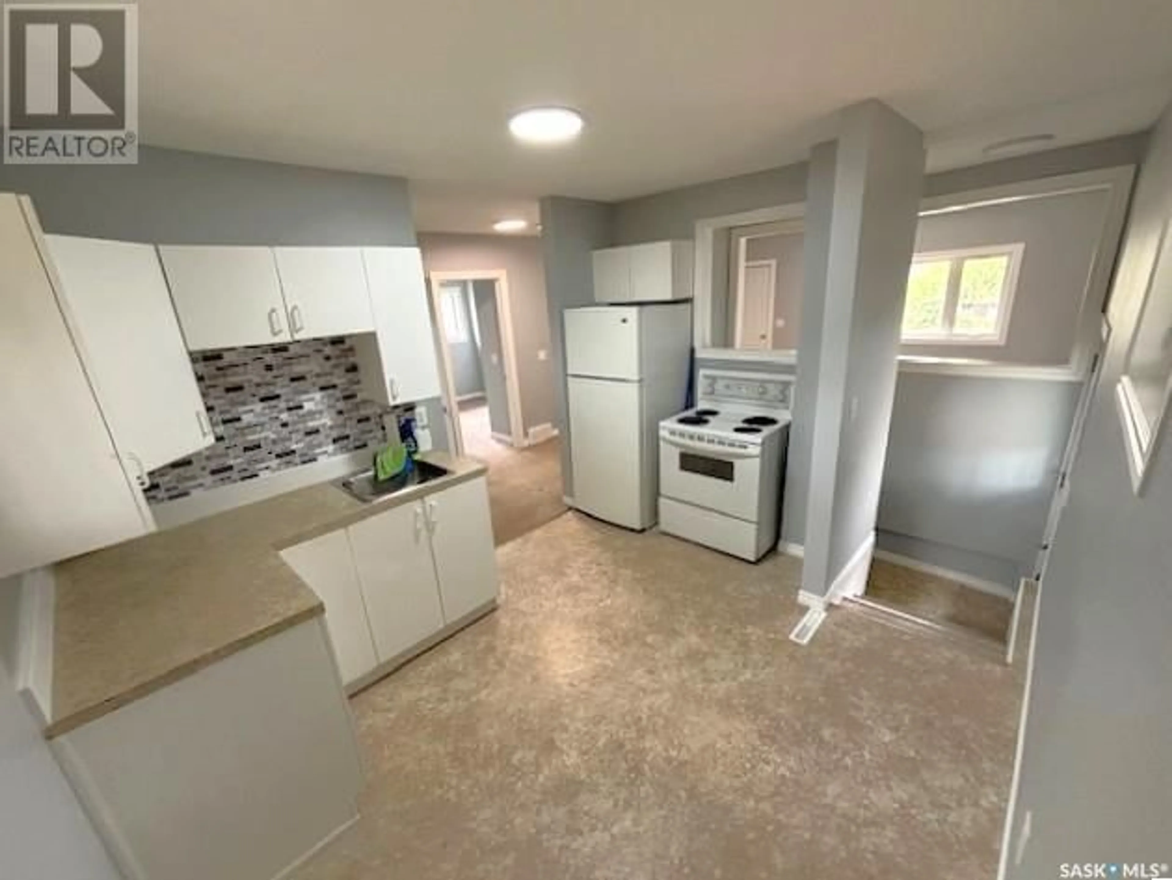 Open concept kitchen, unknown for 809 CARTIER AVENUE, Moose Jaw Saskatchewan S6H1L9
