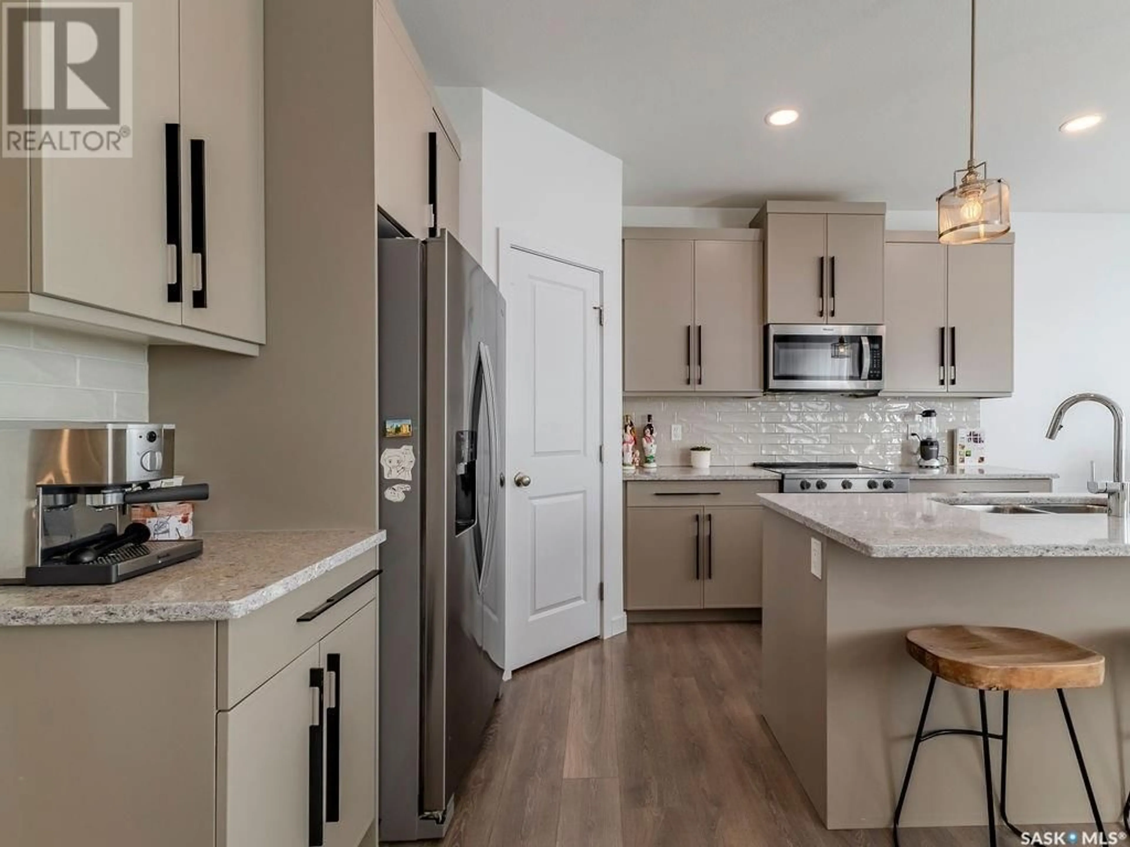 Open concept kitchen, ceramic/tile floor for 598 MCFAULL CRESCENT, Saskatoon Saskatchewan S7V0T3