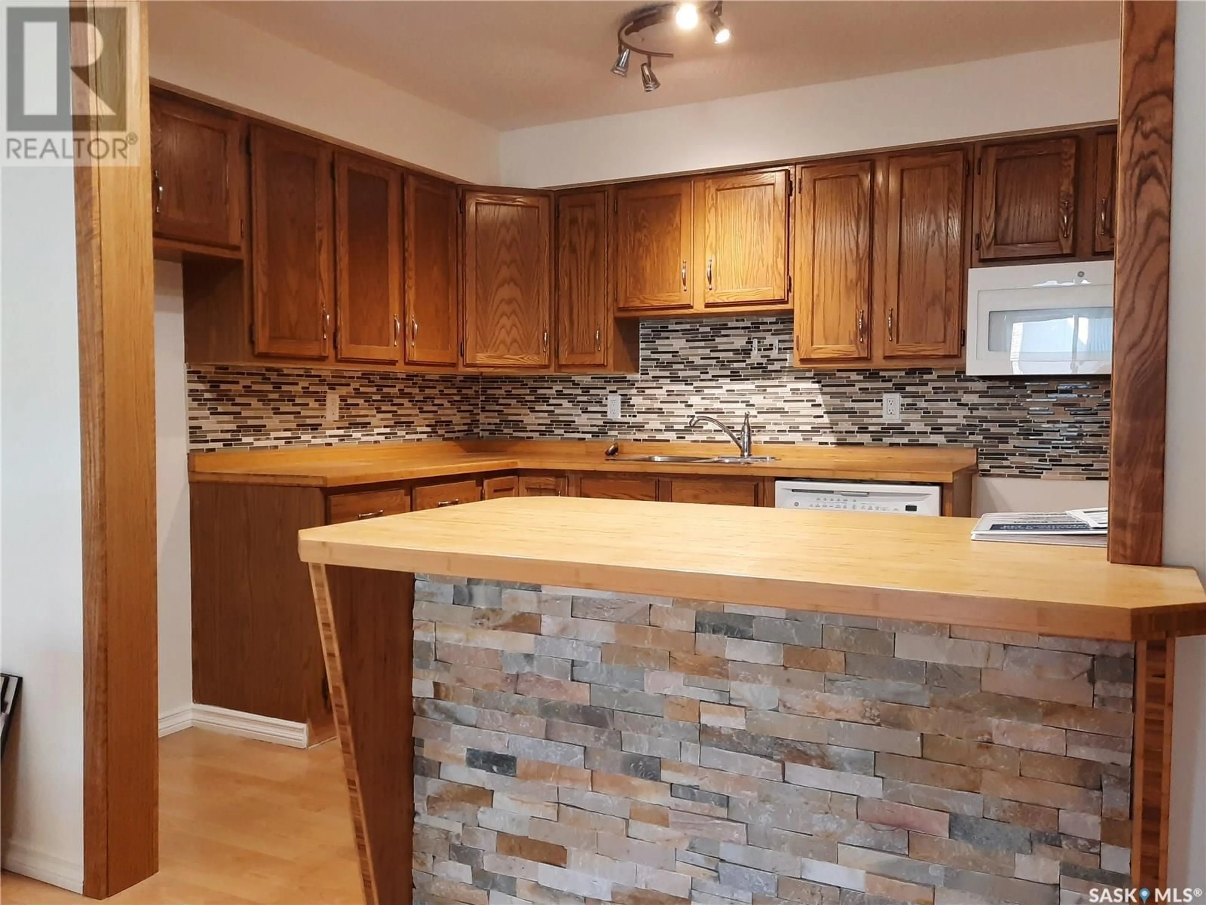 Open concept kitchen, unknown for 204 - 2237 MCINTYRE STREET, Regina Saskatchewan S4P2S1