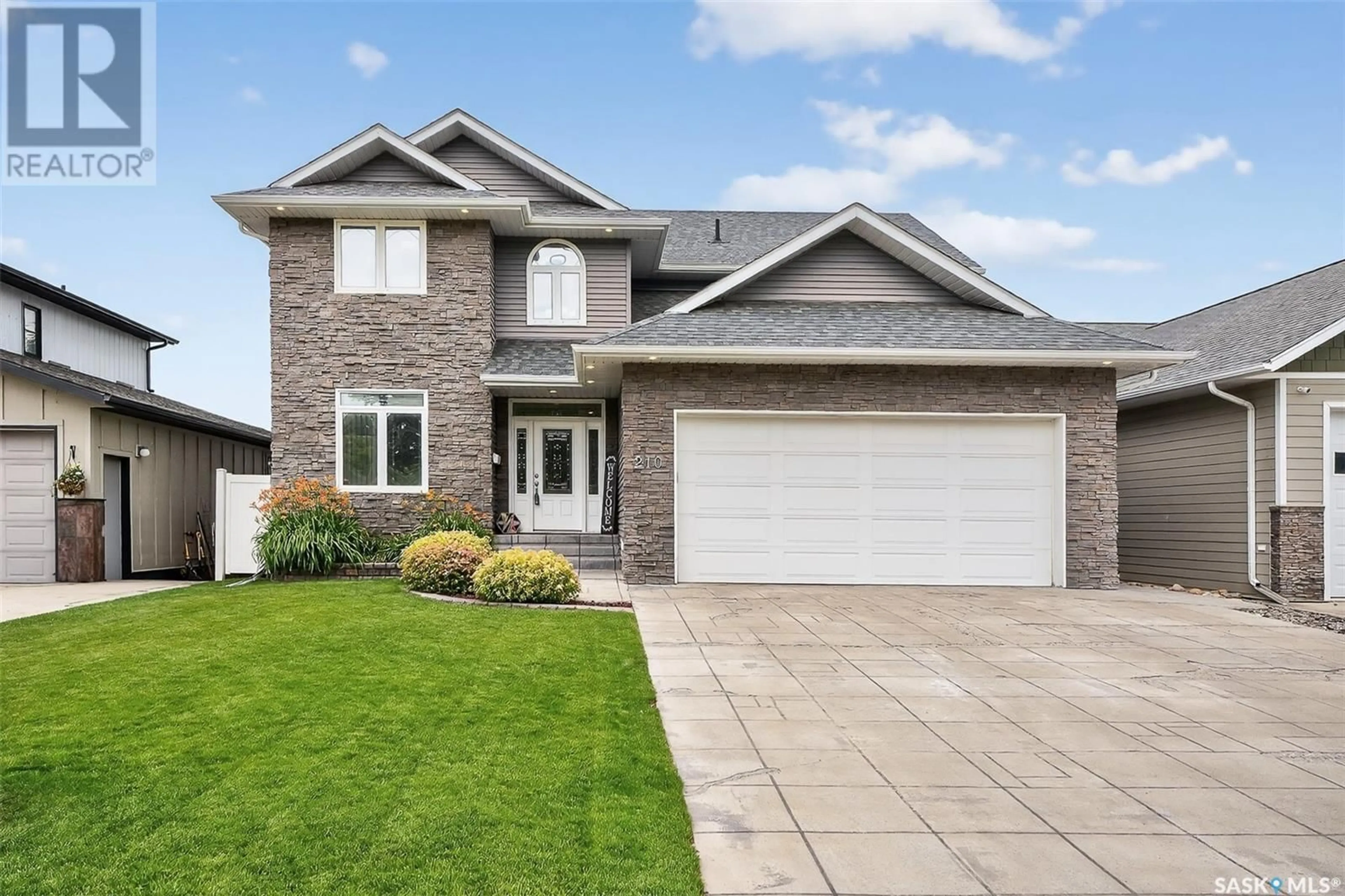 Home with brick exterior material, street for 210 IROQUOIS STREET, Moose Jaw Saskatchewan S6H4T3