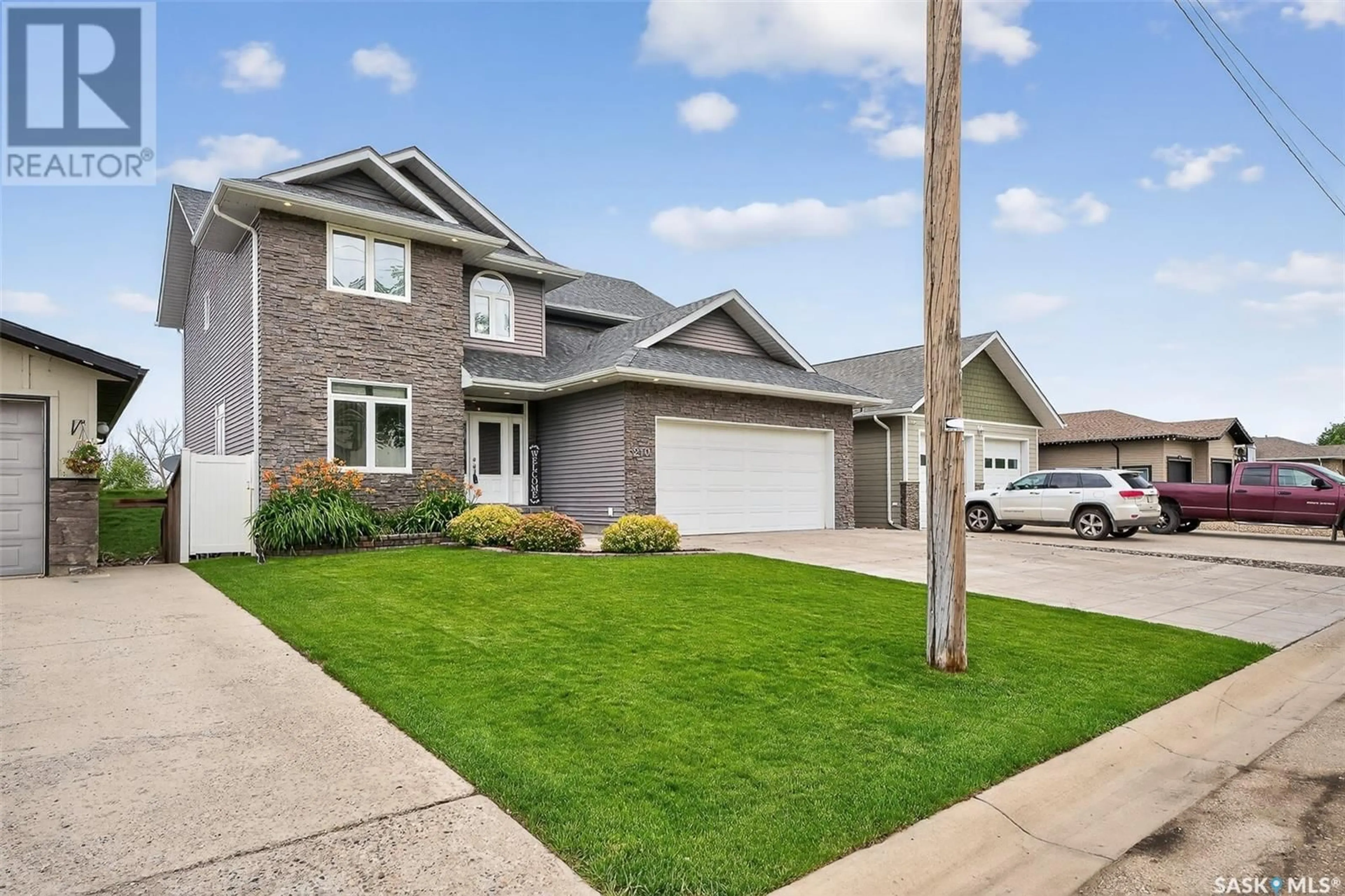 Home with brick exterior material, street for 210 IROQUOIS STREET, Moose Jaw Saskatchewan S6H4T3
