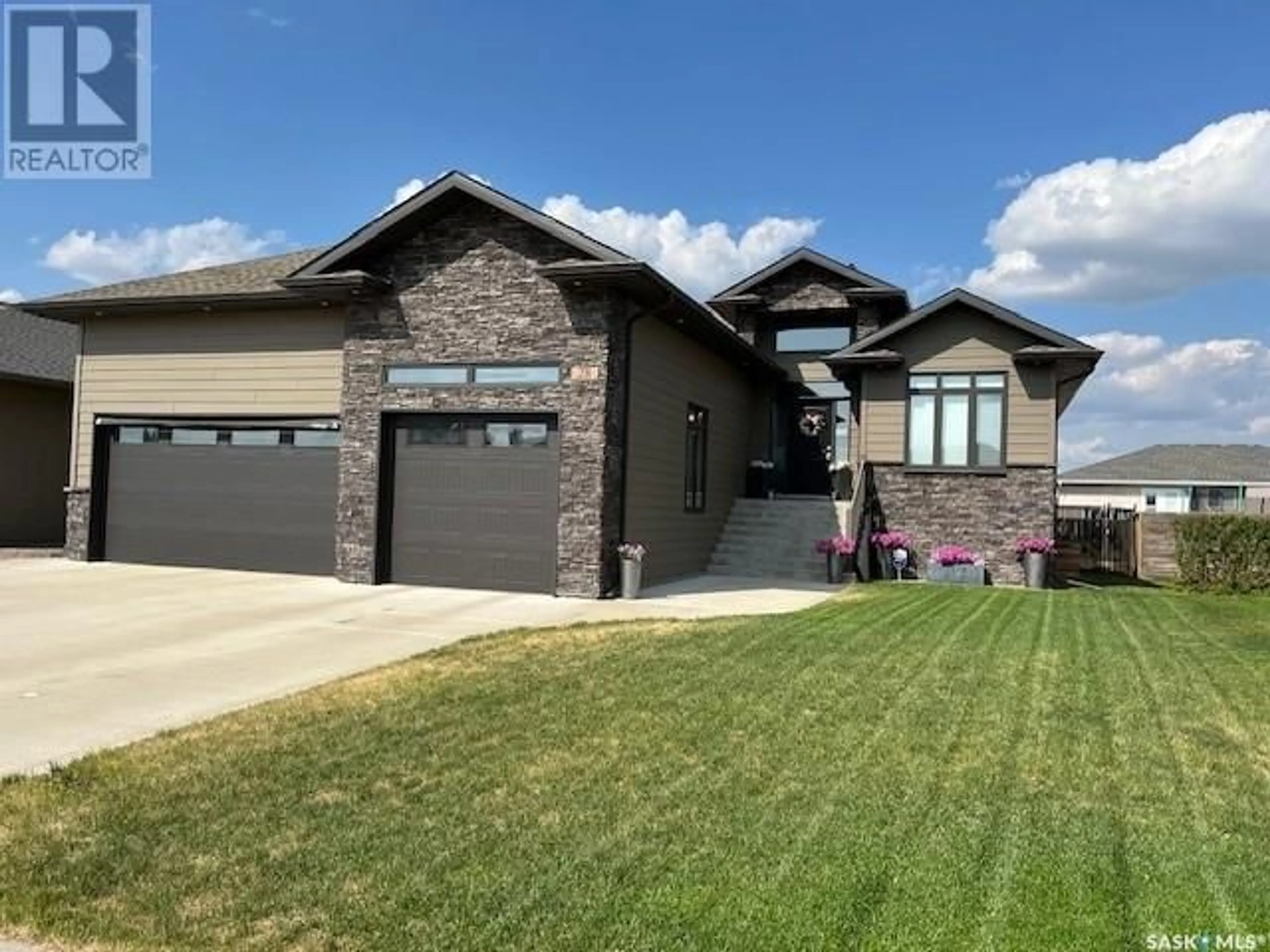 Home with vinyl exterior material, street for 28 SMILEY DRIVE, Prince Albert Saskatchewan S6X0B3